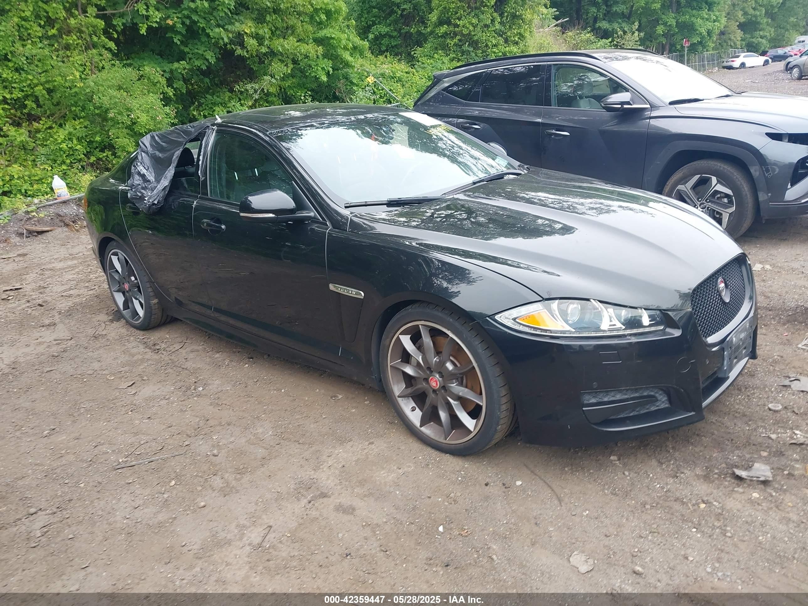 2015 Jaguar XF Portfolio, VIN SAJWJ0FF7F8U50114 — Side