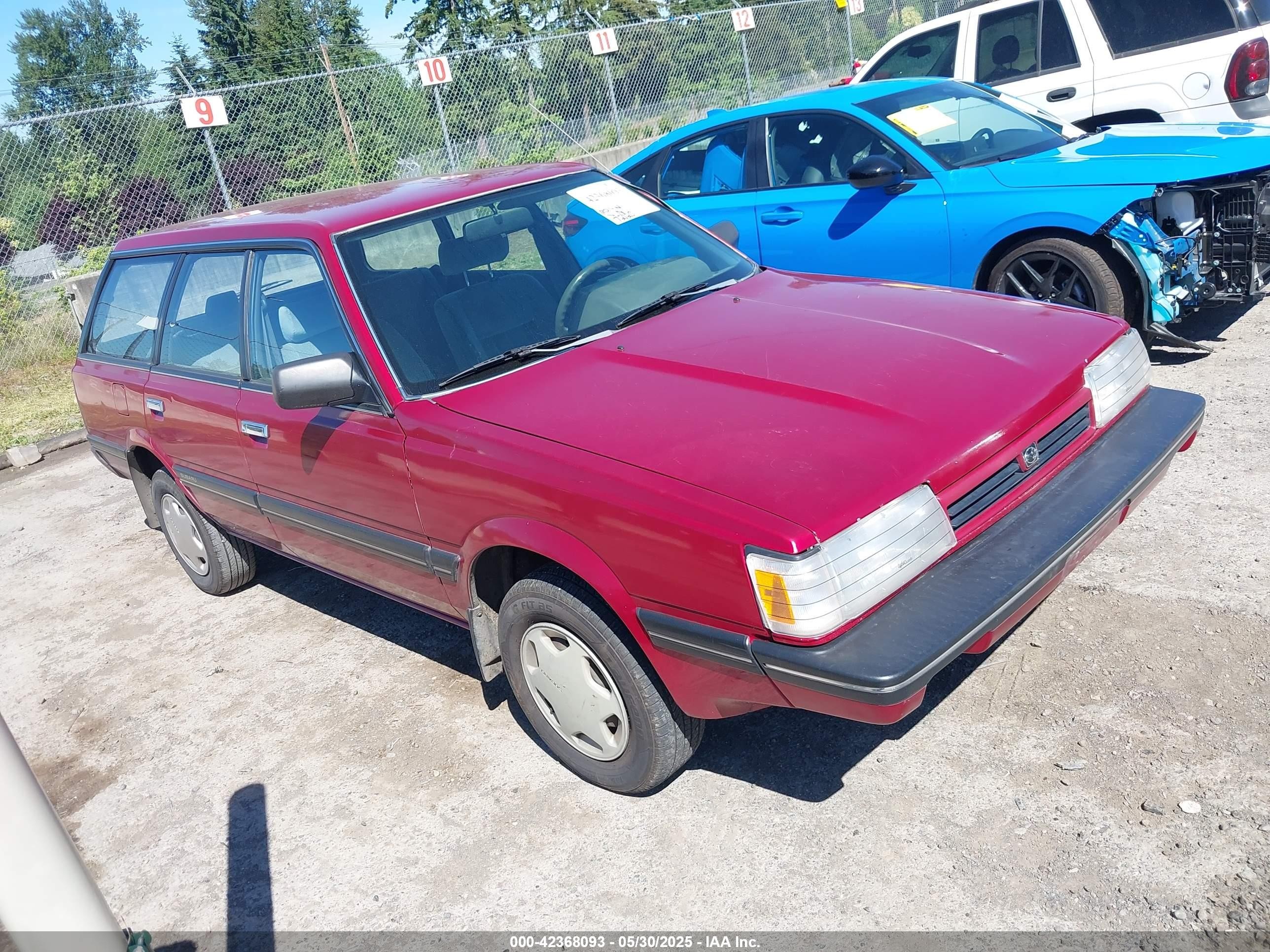 1989 Subaru GL, VIN JF2AN53B8KE414862 — Side