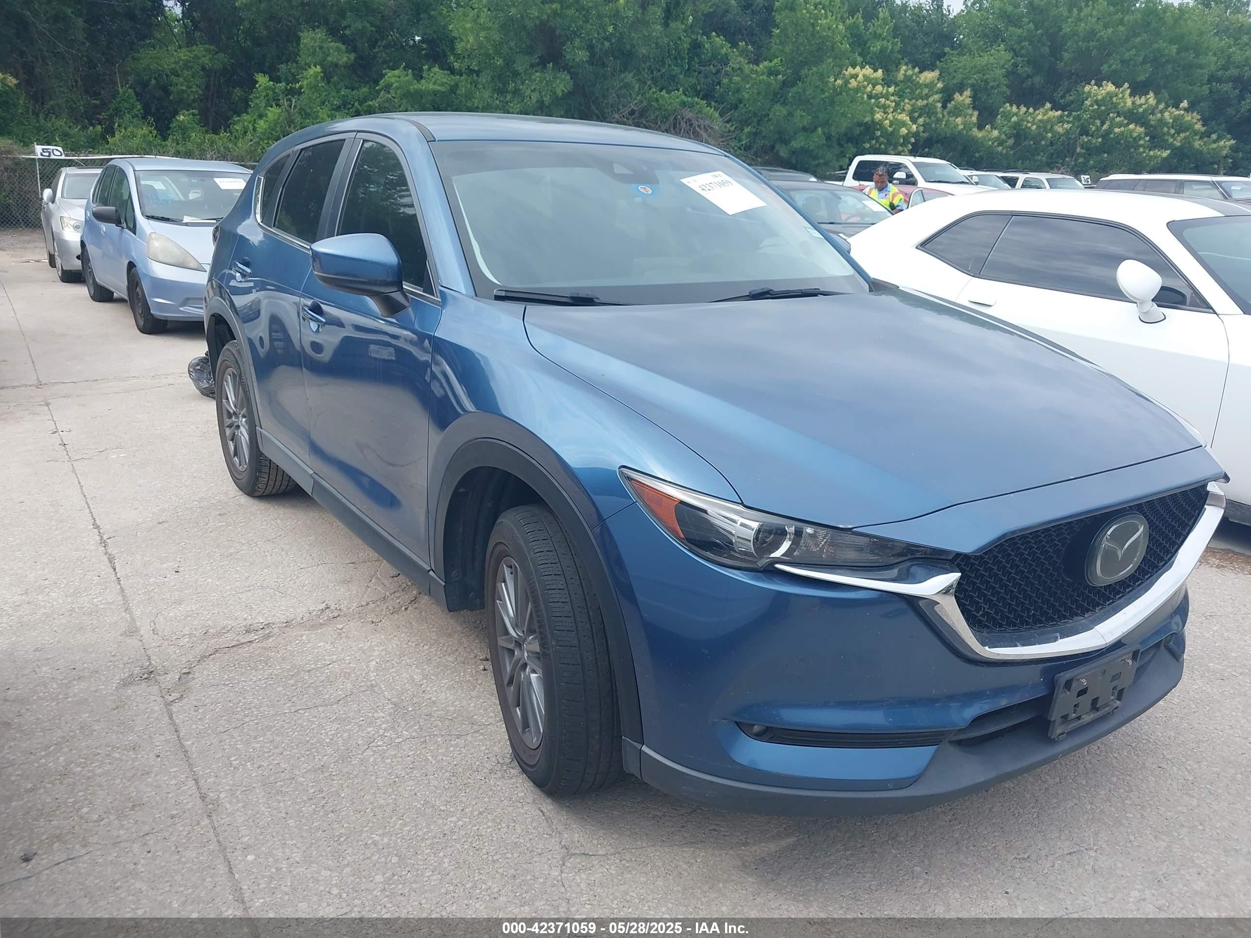 2017 Mazda CX-5 Touring, VIN JM3KFACLXH0116389 — Auction photo