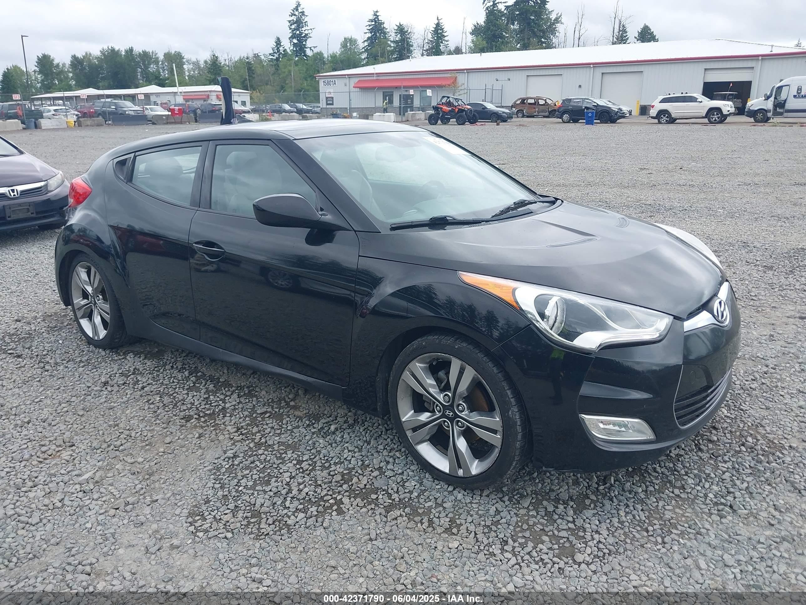 2012 Hyundai Veloster w/Gray Int, VIN KMHTC6AD4CU062034 — Rear end