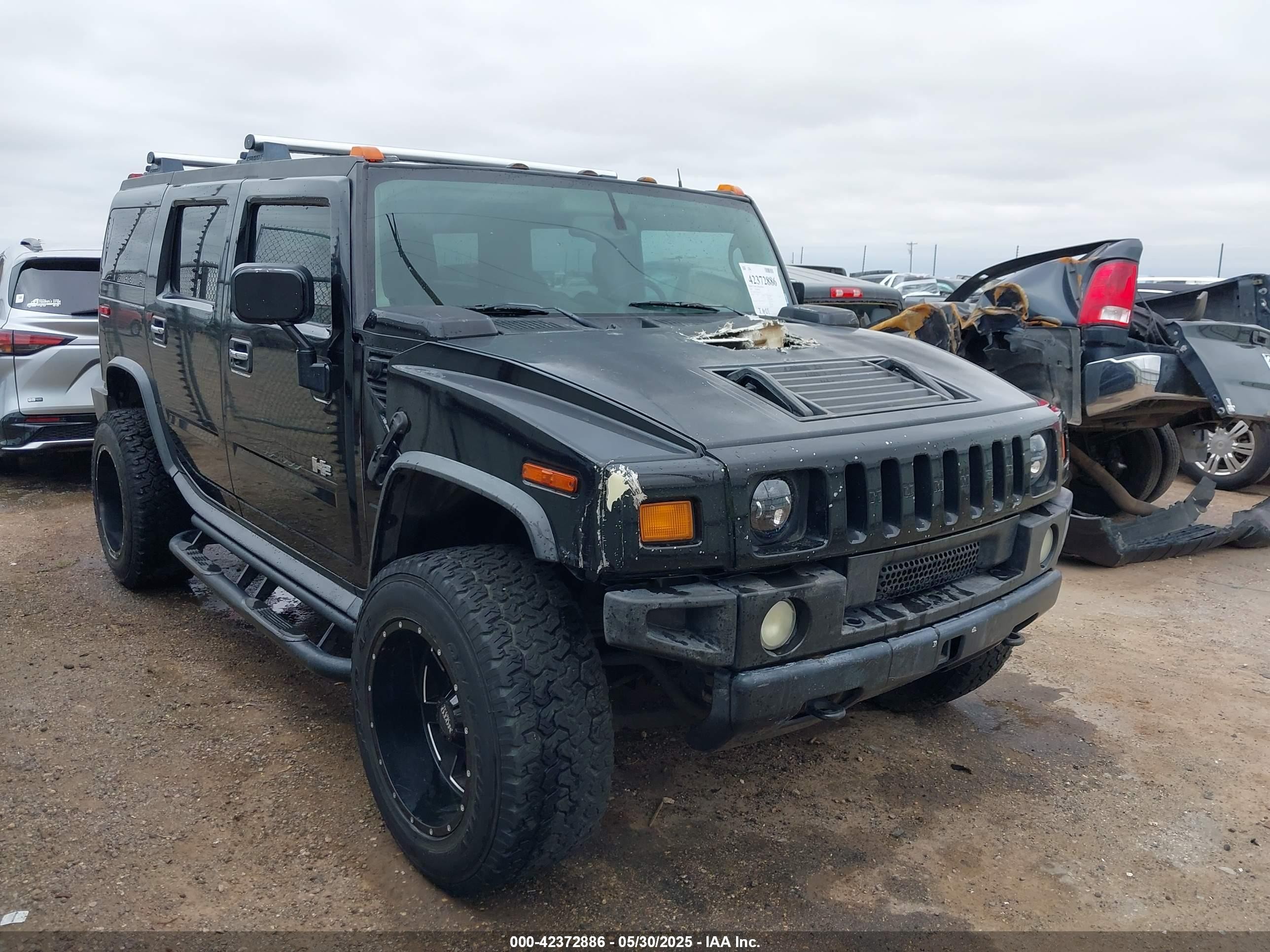 2004 Hummer H2, VIN 5GRGN23U34H118611 — Engine fire