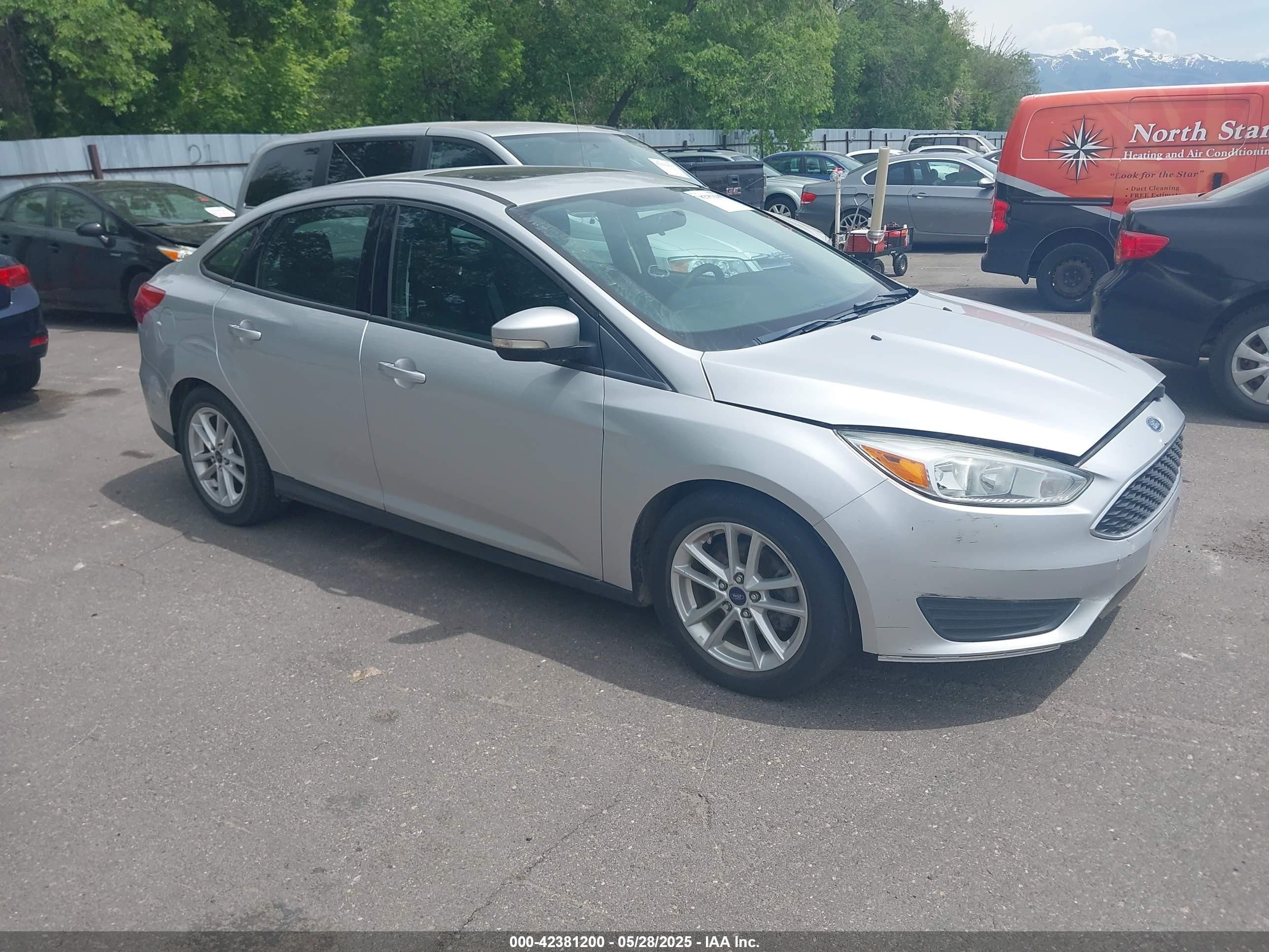 2016 Ford Focus SE, VIN 1FADP3F29GL294410 — All over