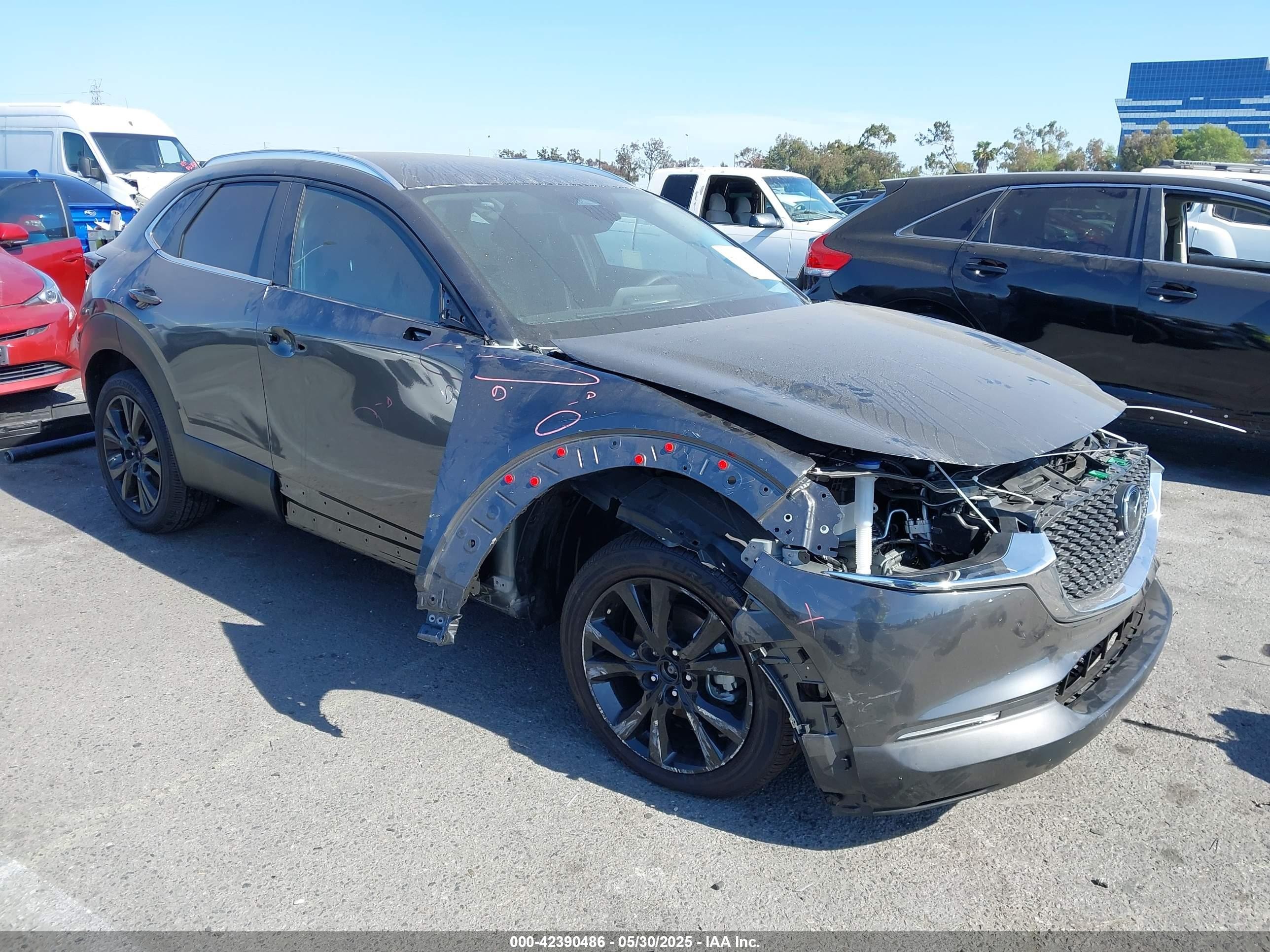 2024 Mazda CX-30 S Select Sport, VIN 3MVDMBBM8RM716638 — Front end