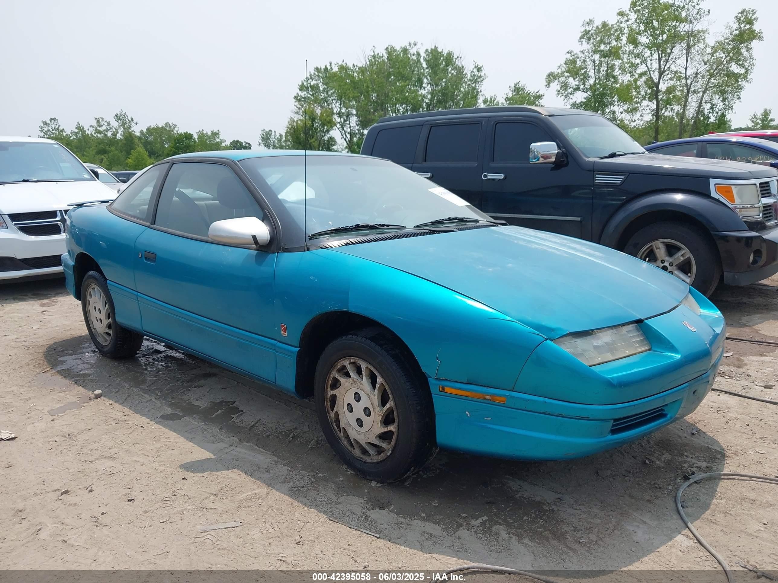 1994 Saturn SC, VIN 1G8ZF1599RZ323128 — Фото с аукциона 1 of 5