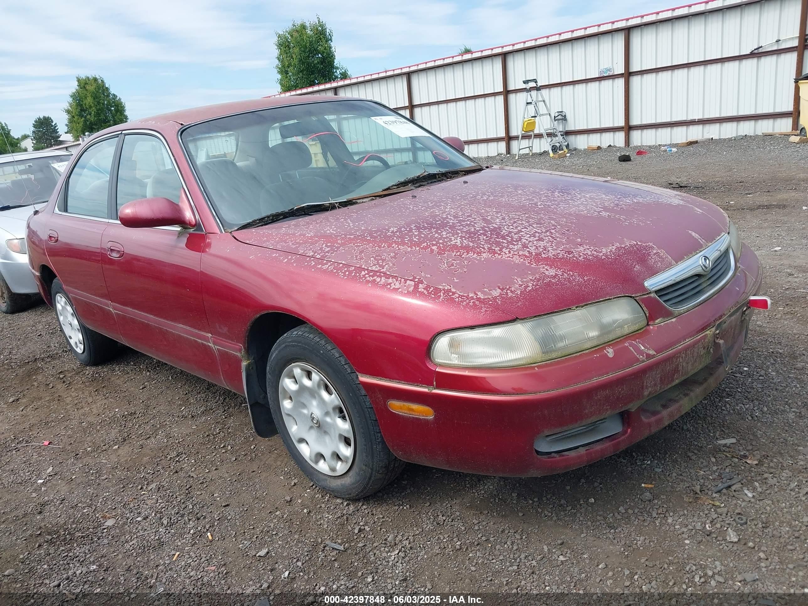 1997 Mazda 626 DX, VIN 1YVGE22C8V5621462 — Front end