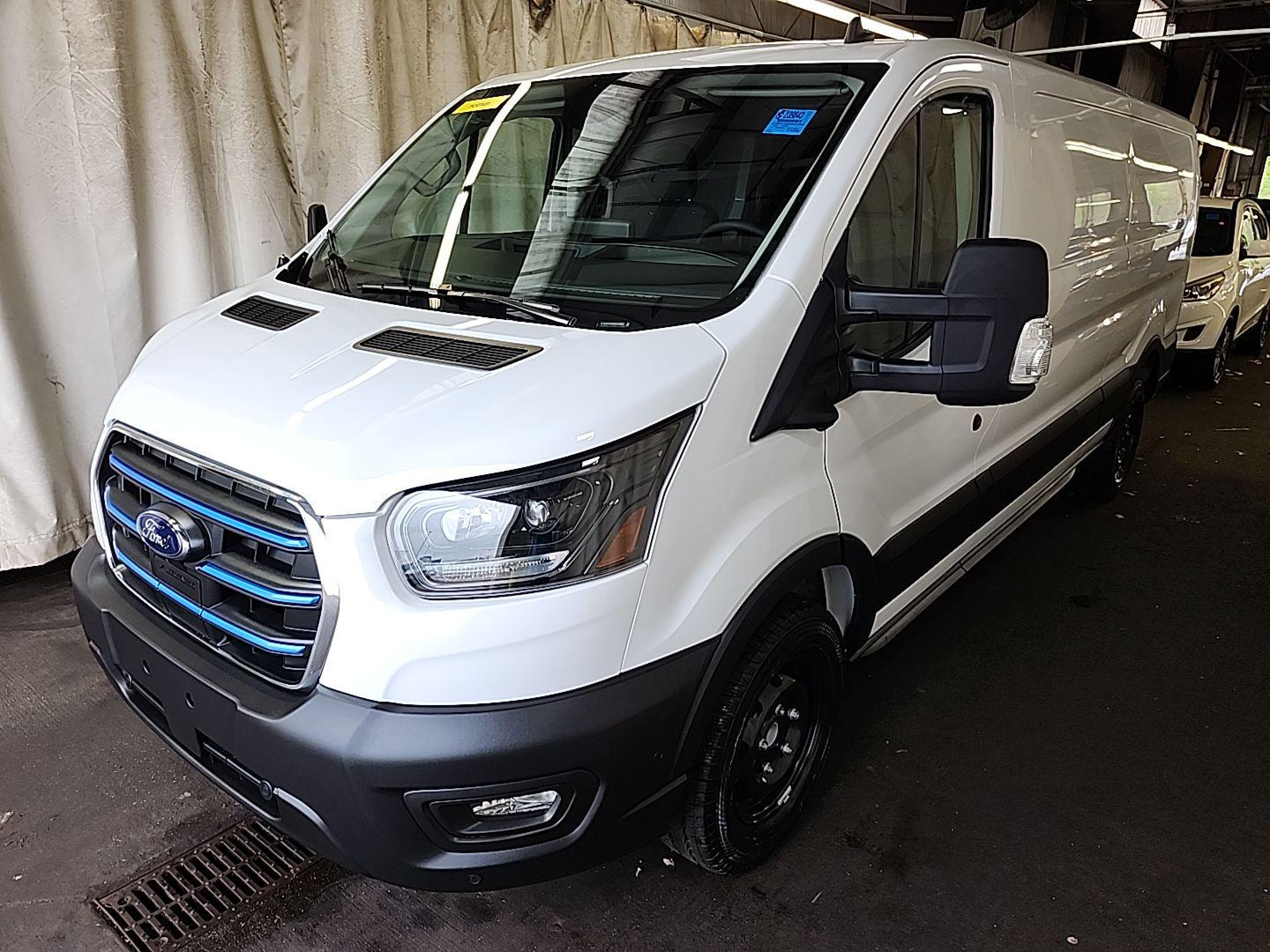 2025 Ford E-Transit, VIN 1FTBW1YM0SKA13004 — Normal wear