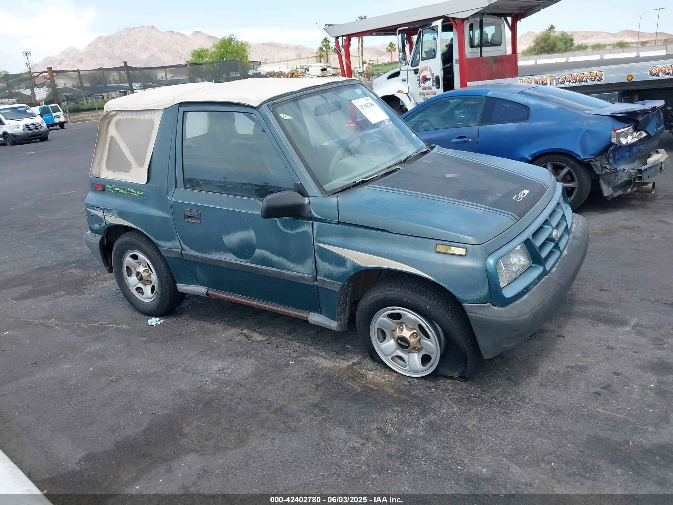 1996 Chevrolet Tracker, VIN 2CNBE1868T6903108 — Side