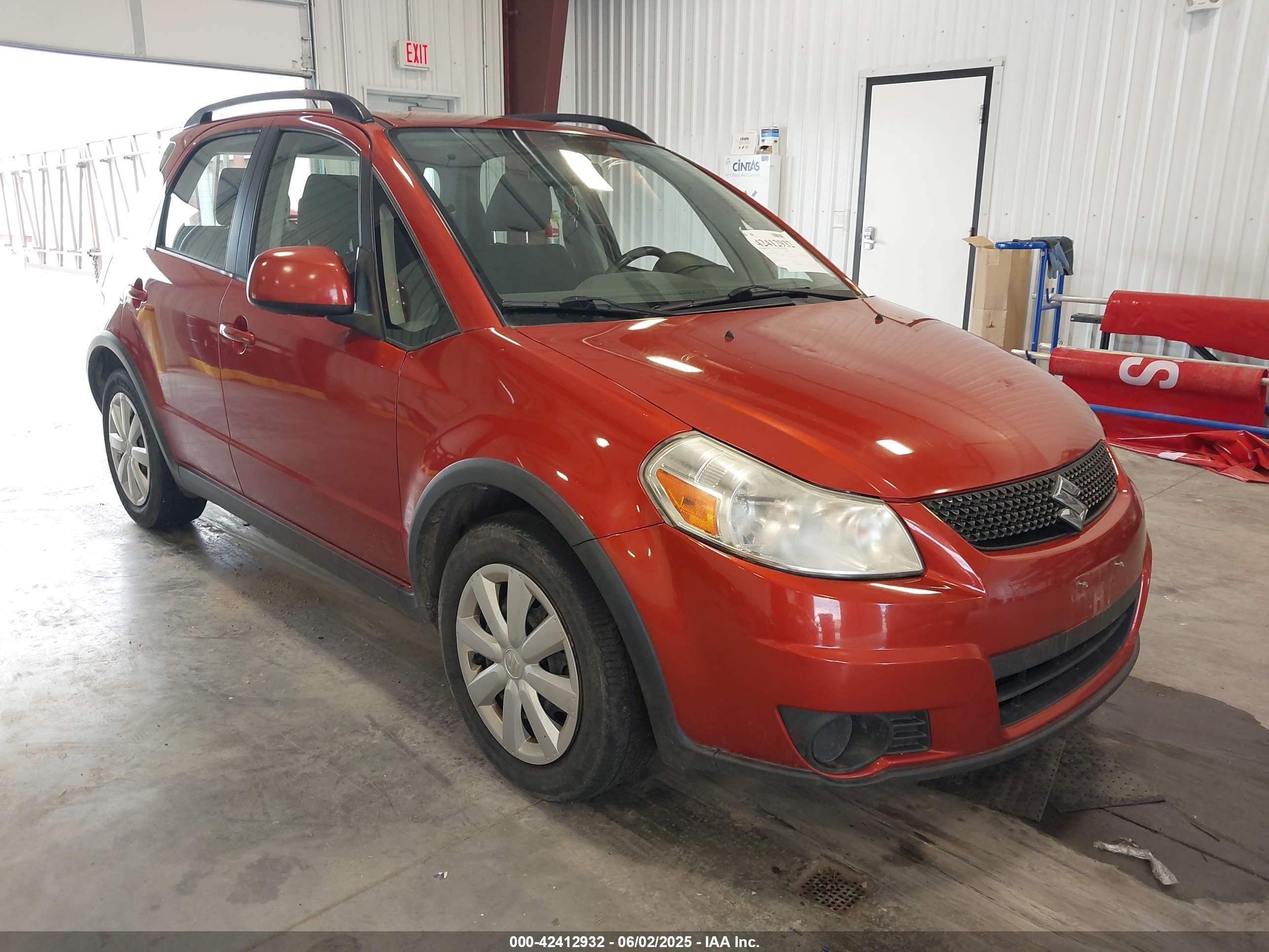 2011 Suzuki SX4 Crossover, VIN JS2YB5A31B6303734 — Hail