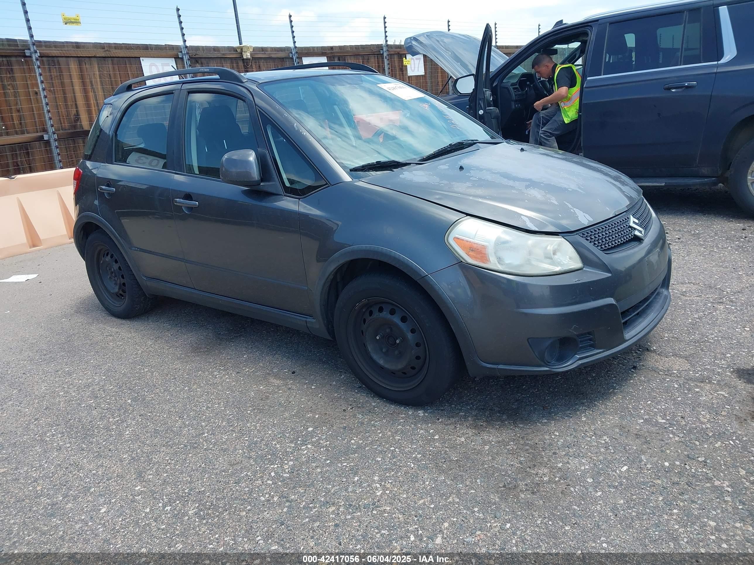 2010 Suzuki SX4, VIN JS2YB5A34A6301894 — Hail