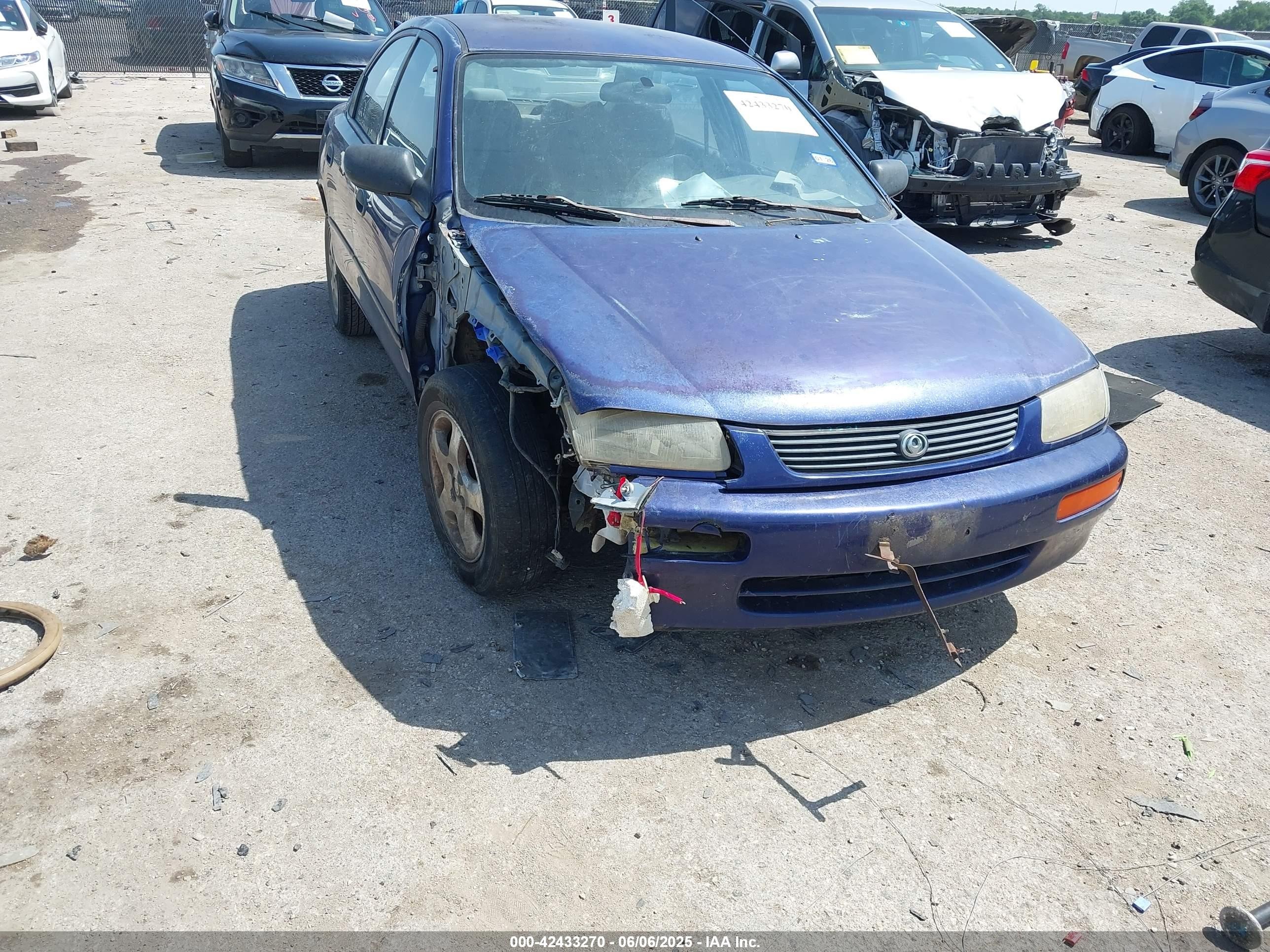 1996 Mazda Protege DX, VIN JM1BB141XT0306641 — Перед