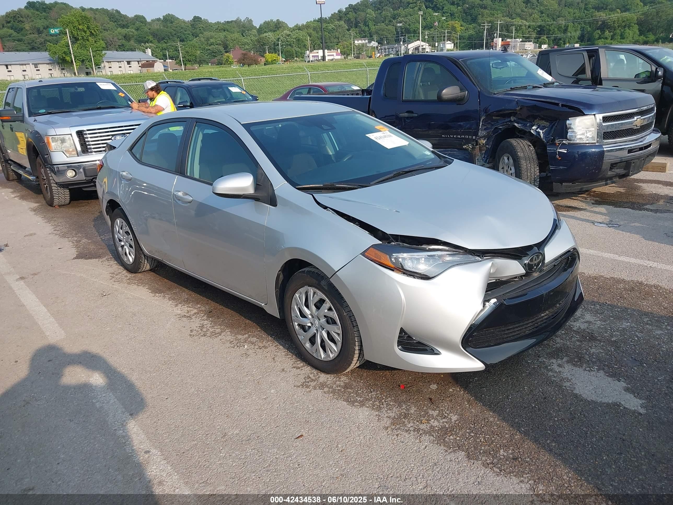 2018 Toyota Corolla L, VIN 5YFBURHE9JP812485 — Rear end
