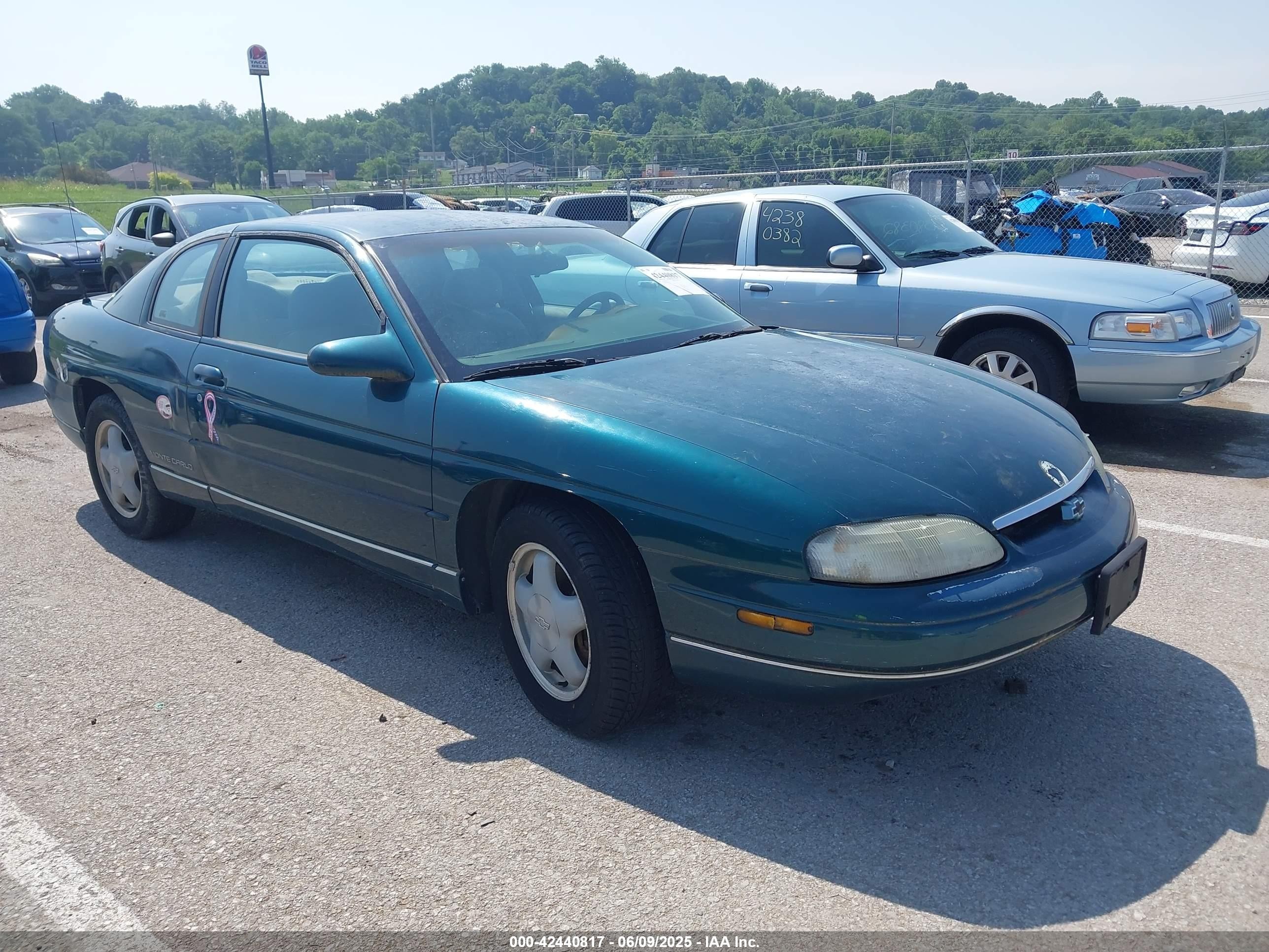 1999 Chevrolet Monte Carlo LS, VIN 2G1WW12M2X9274632 — Side