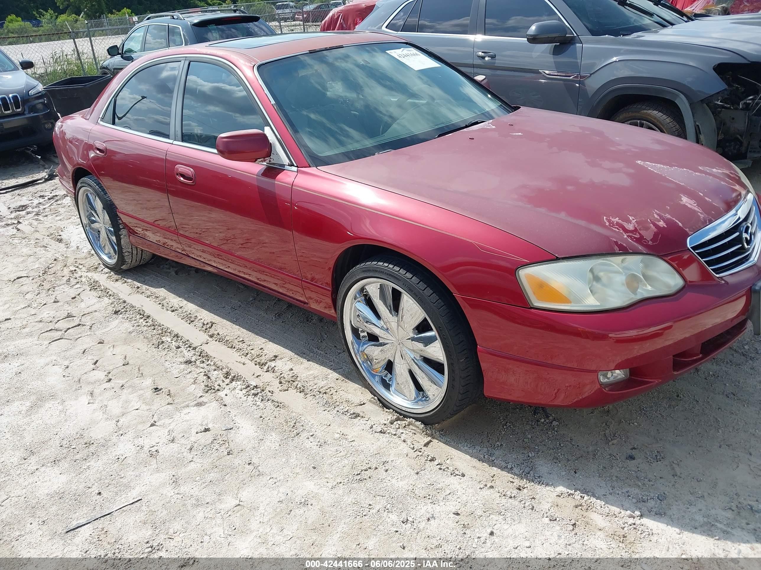 2001 Mazda Millenia, VIN JM1TA221911707878 — Обычный износ