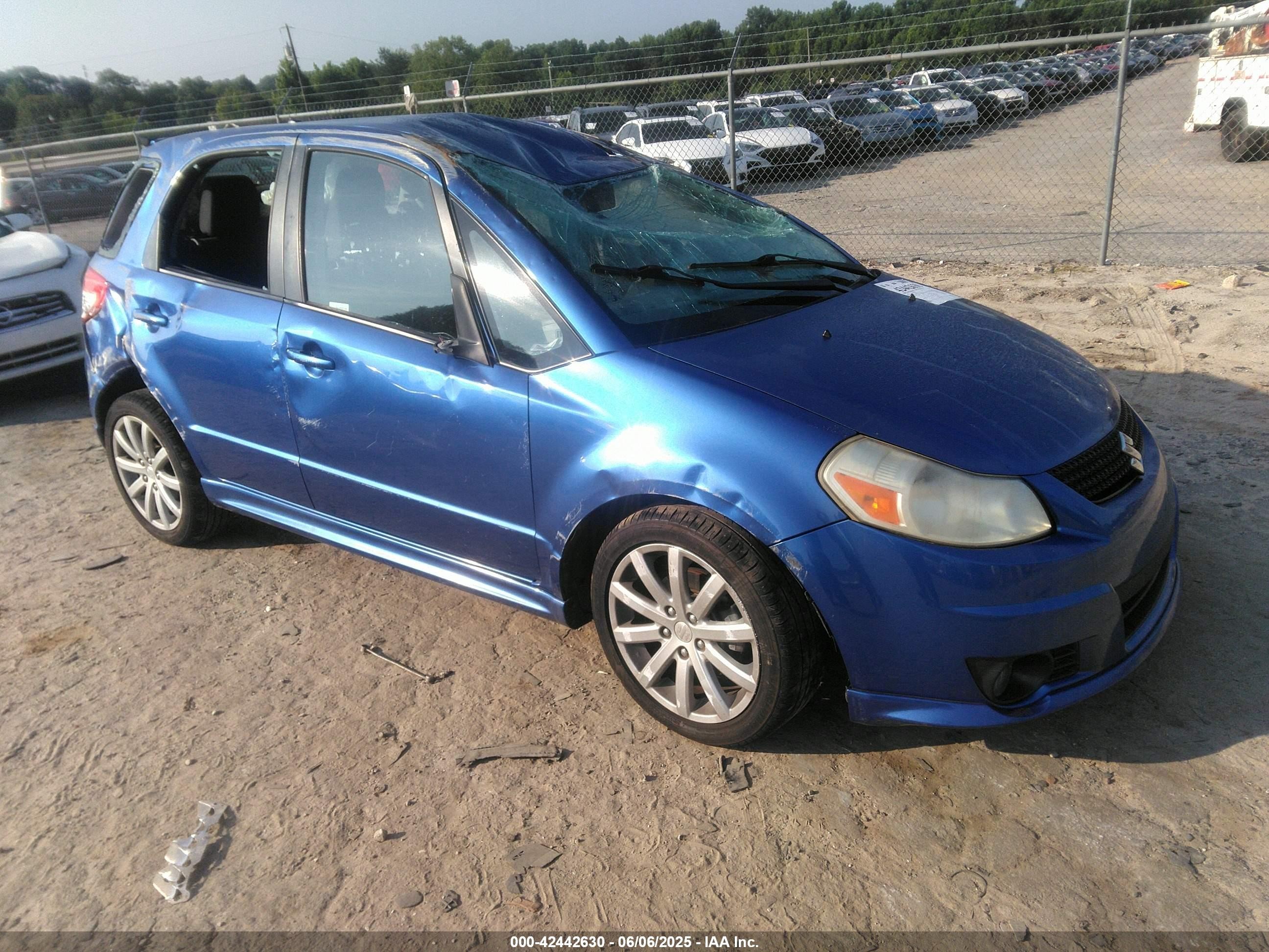 2012 Suzuki SX4 Sportback, VIN JS2YA5A51C6300872 — Rollover