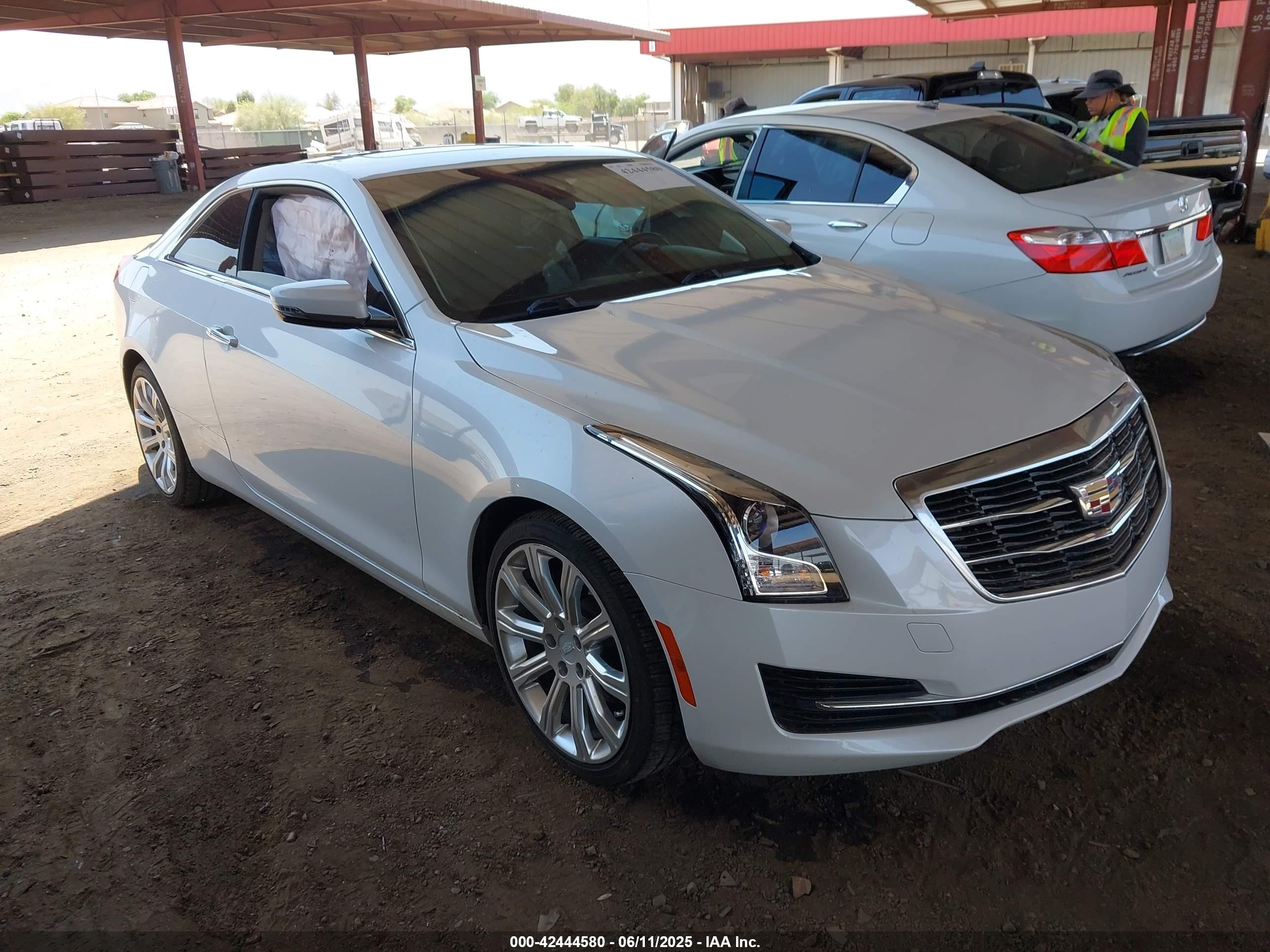 2017 Cadillac ATS RWD, VIN 1G6AA1RX1H0149779 — Side