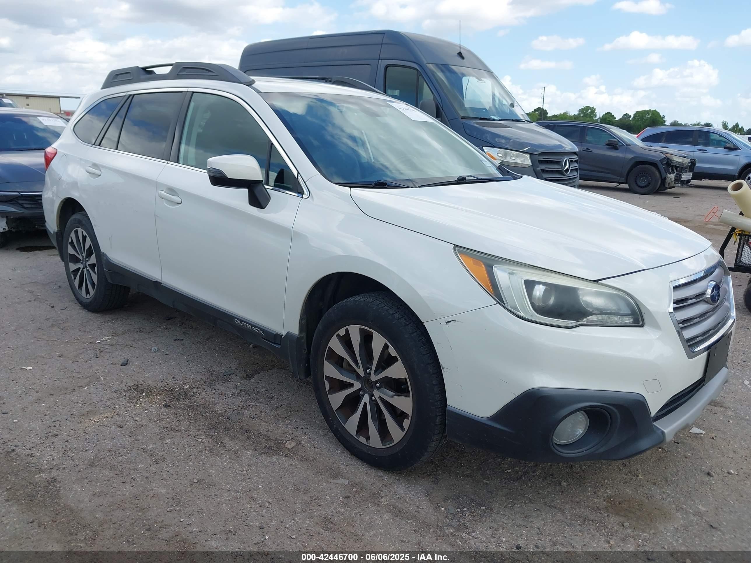 2016 Subaru Outback Limited, VIN 4S4BSBNC8G3336212 — Side