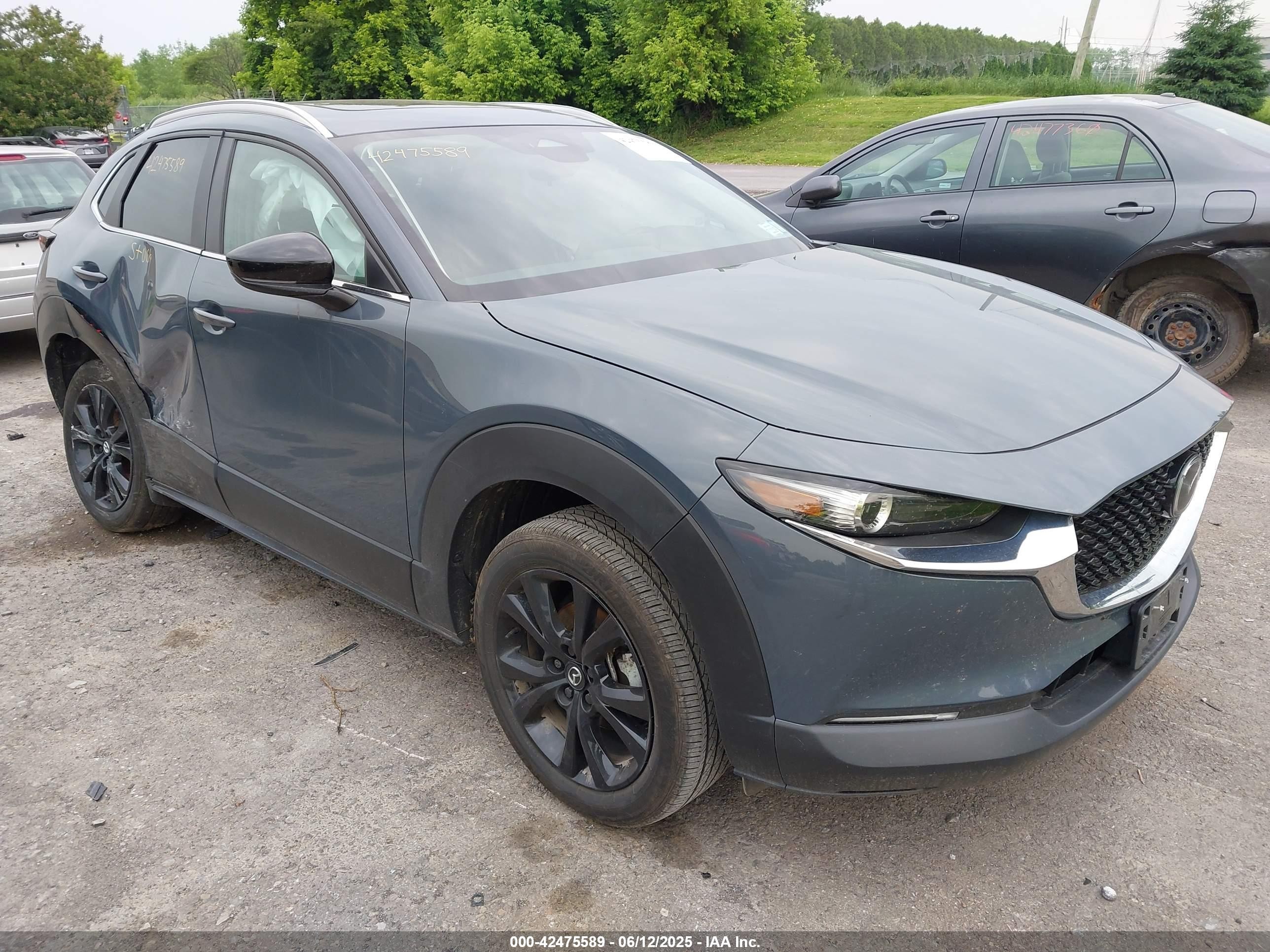 2024 Mazda CX-30 S Carbon Edition, VIN 3MVDMBCM8RM642071 — Side