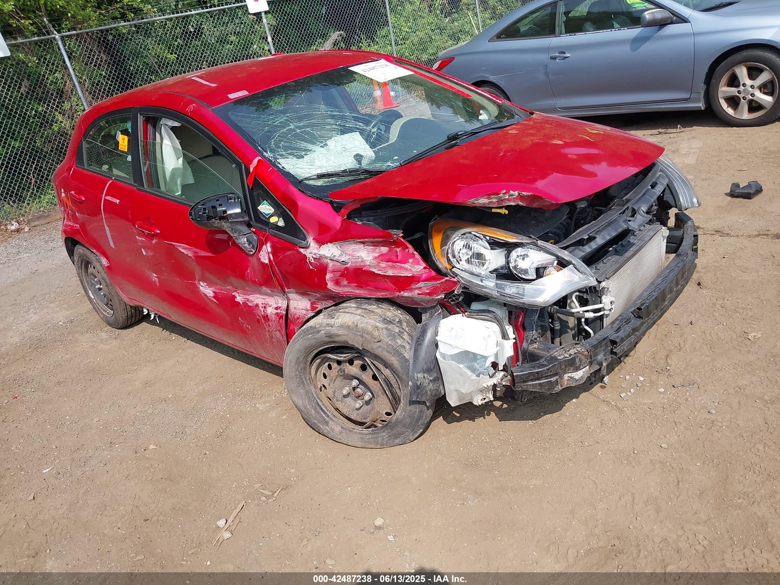 2013 Kia Rio LX, VIN KNADM5A37D6182257 — Side