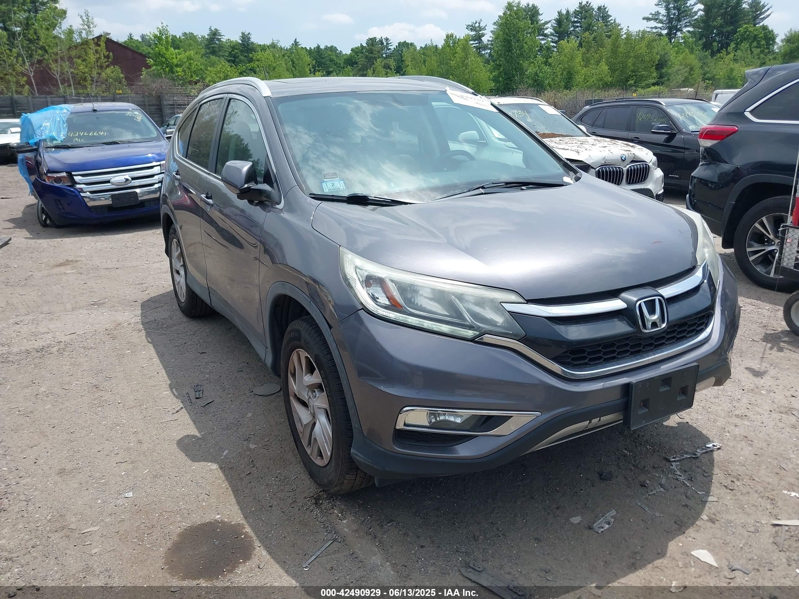 2015 Honda CR-V EX-L, VIN 2HKRM4H7XFH634884 — Rear end