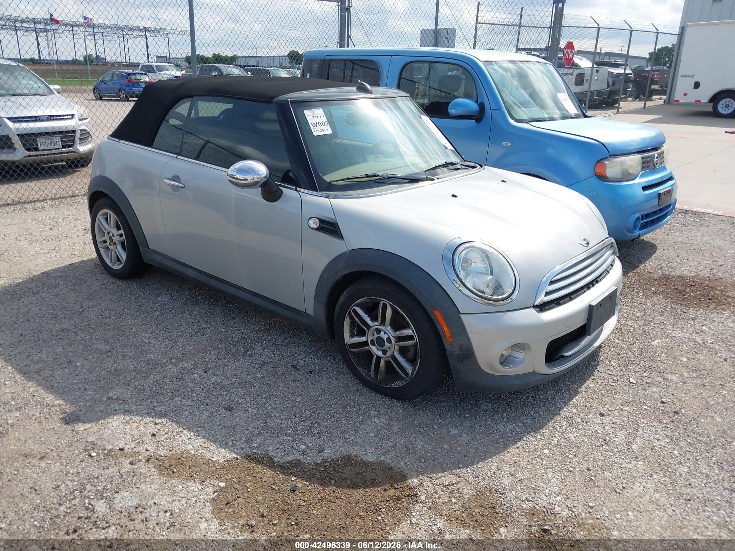 2011 MINI Convertible, VIN WMWZN3C56BT133717 — По всему кузову