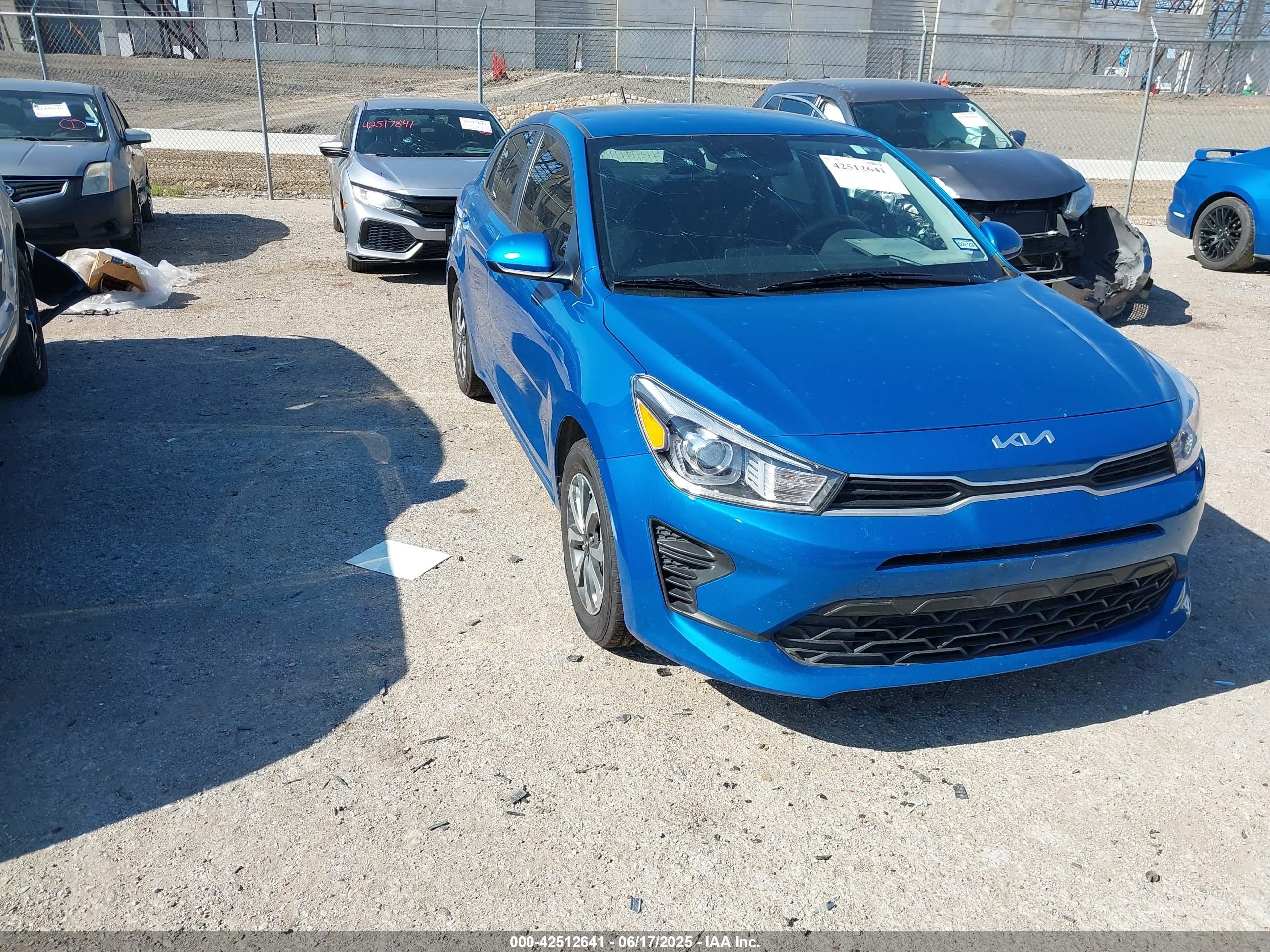 2023 Kia Rio LX, VIN 3KPA24AD9PE552458 — Hail