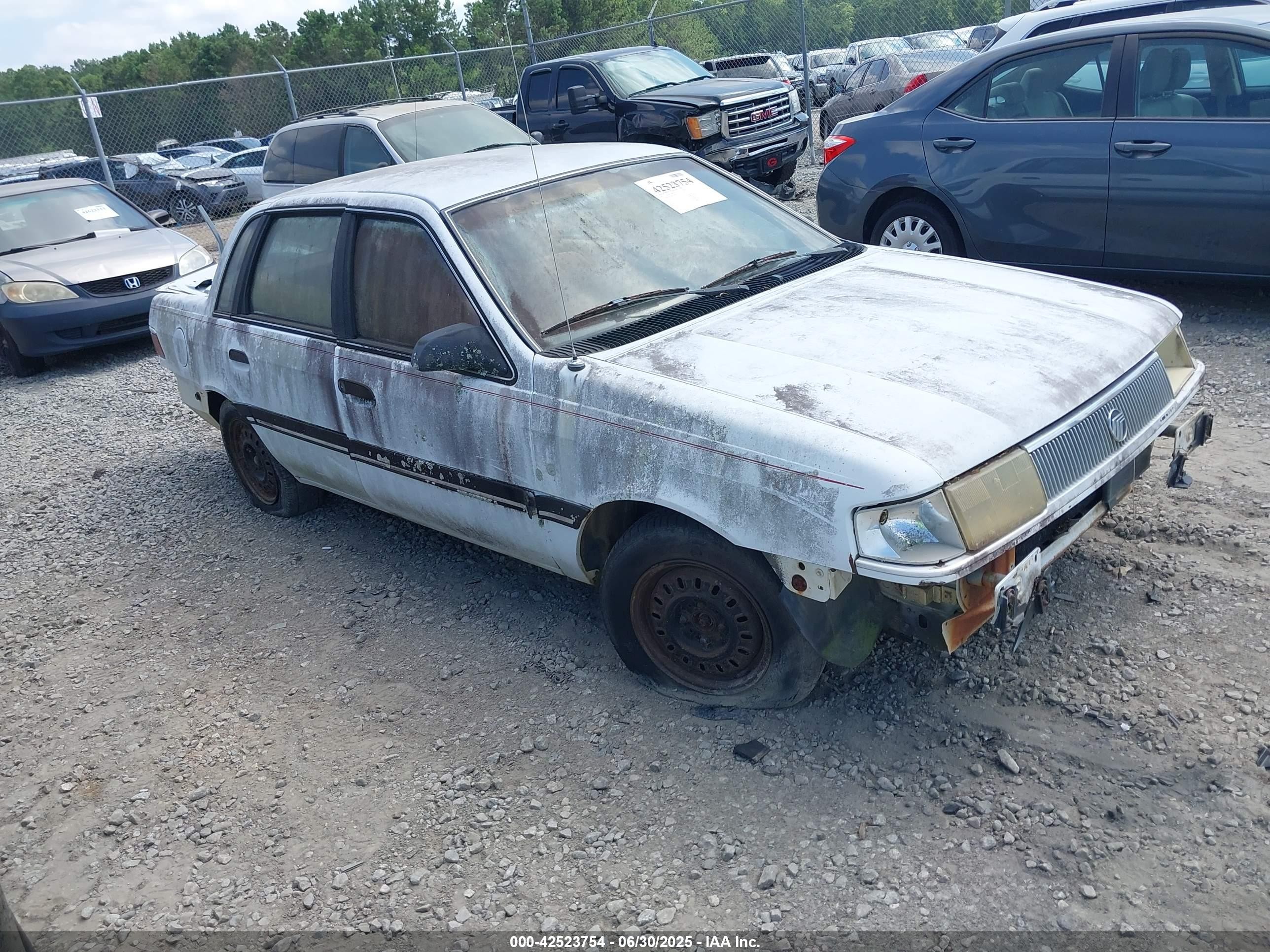 1989 Mercury Topaz, VIN 1MECM37X6KK612988 — По всему кузову