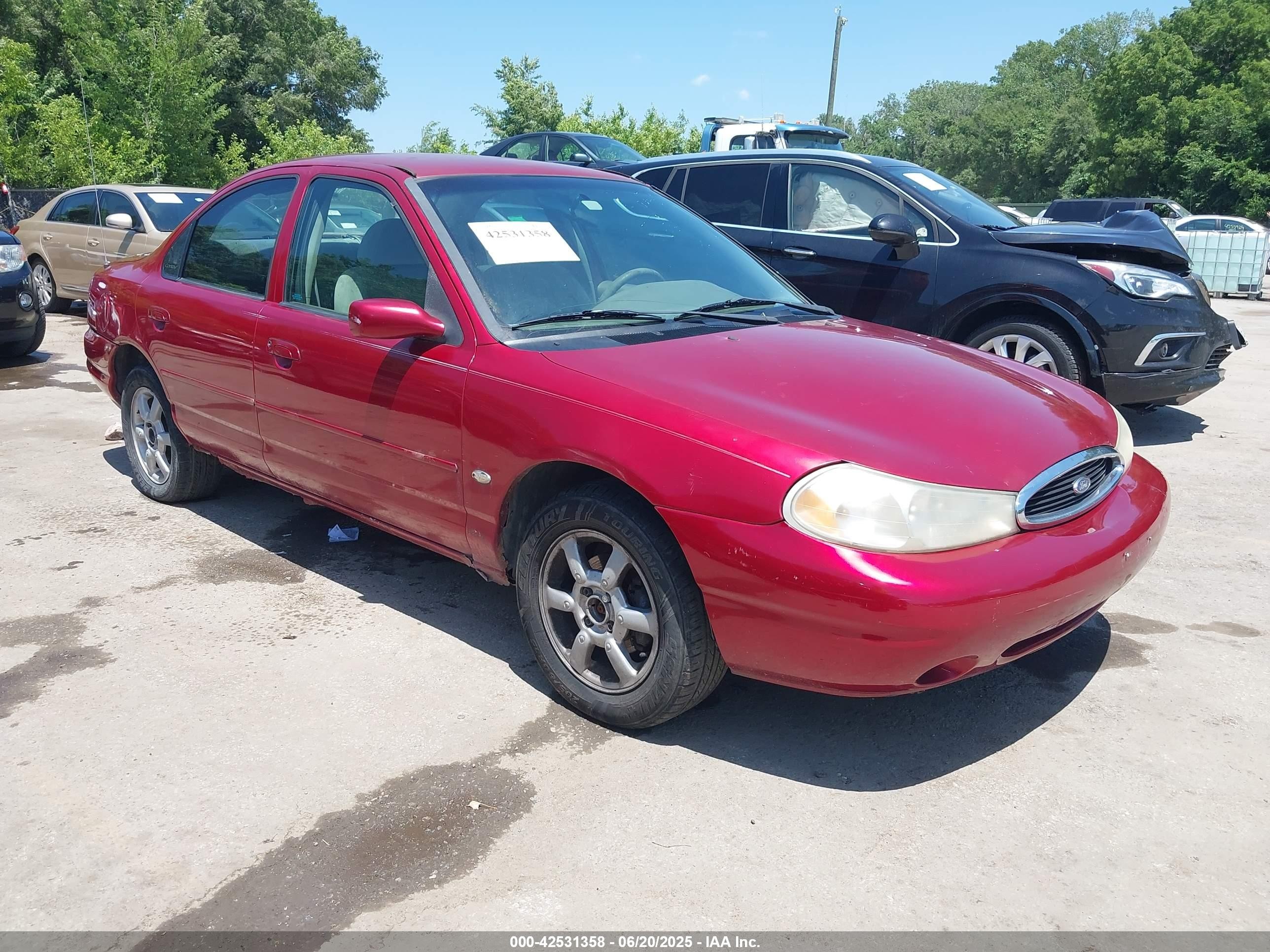 1998 Ford Contour SE Fleet, VIN 1FAFP6630WK305222 — Rear end
