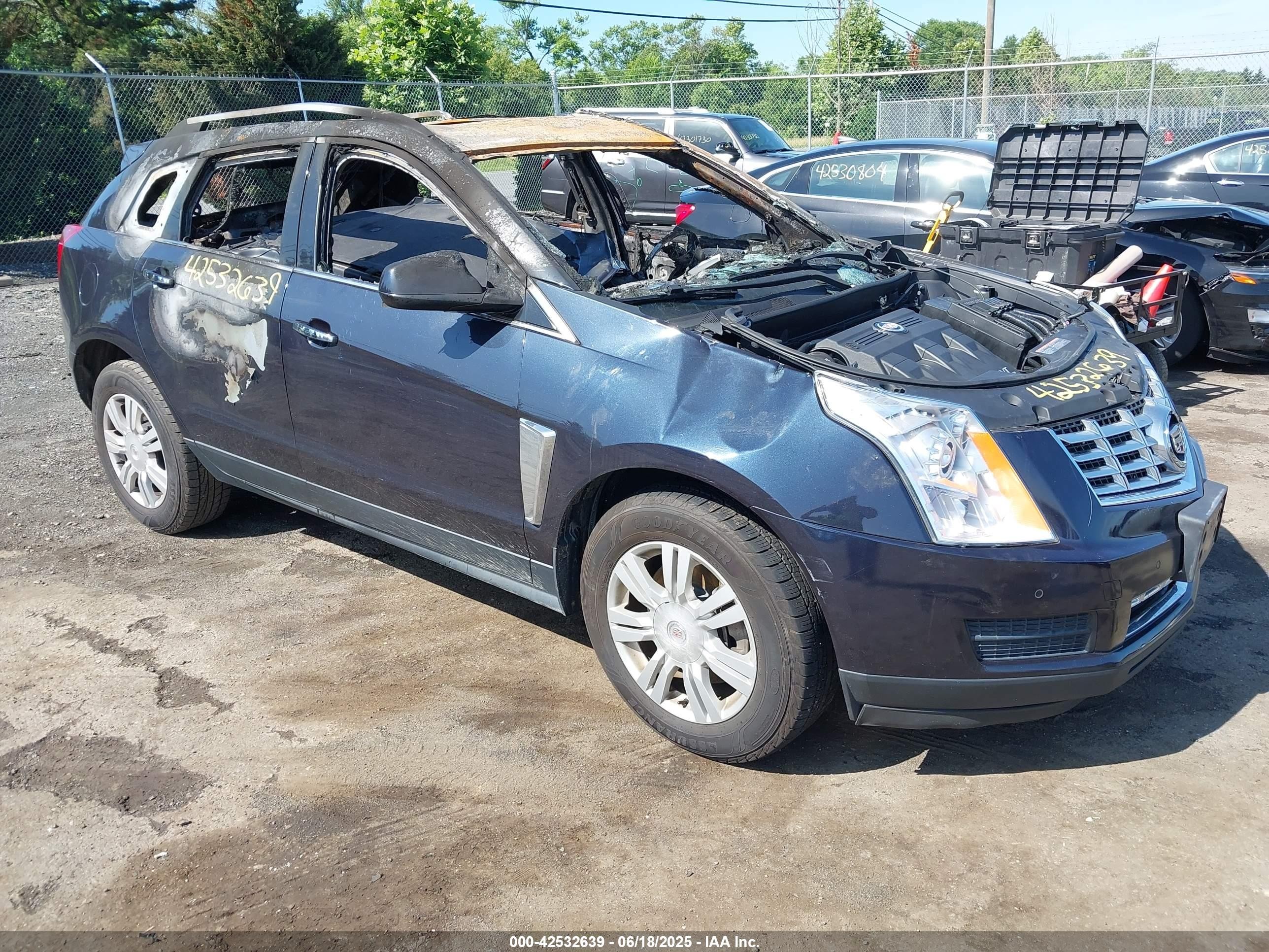2014 Cadillac SRX Luxury Collection, VIN 3GYFNEE33ES531103 — Interior fire