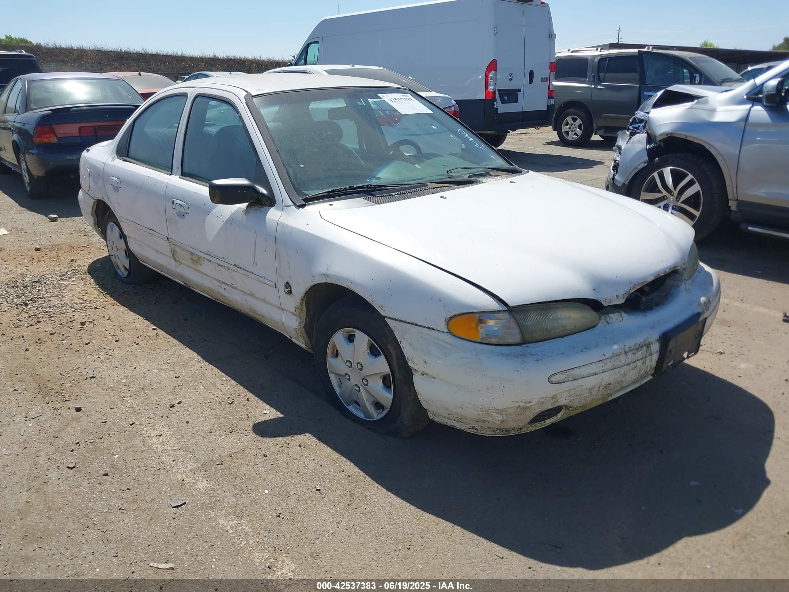 1997 Ford Contour, VIN 1FALP65Z2VK156643 — Side