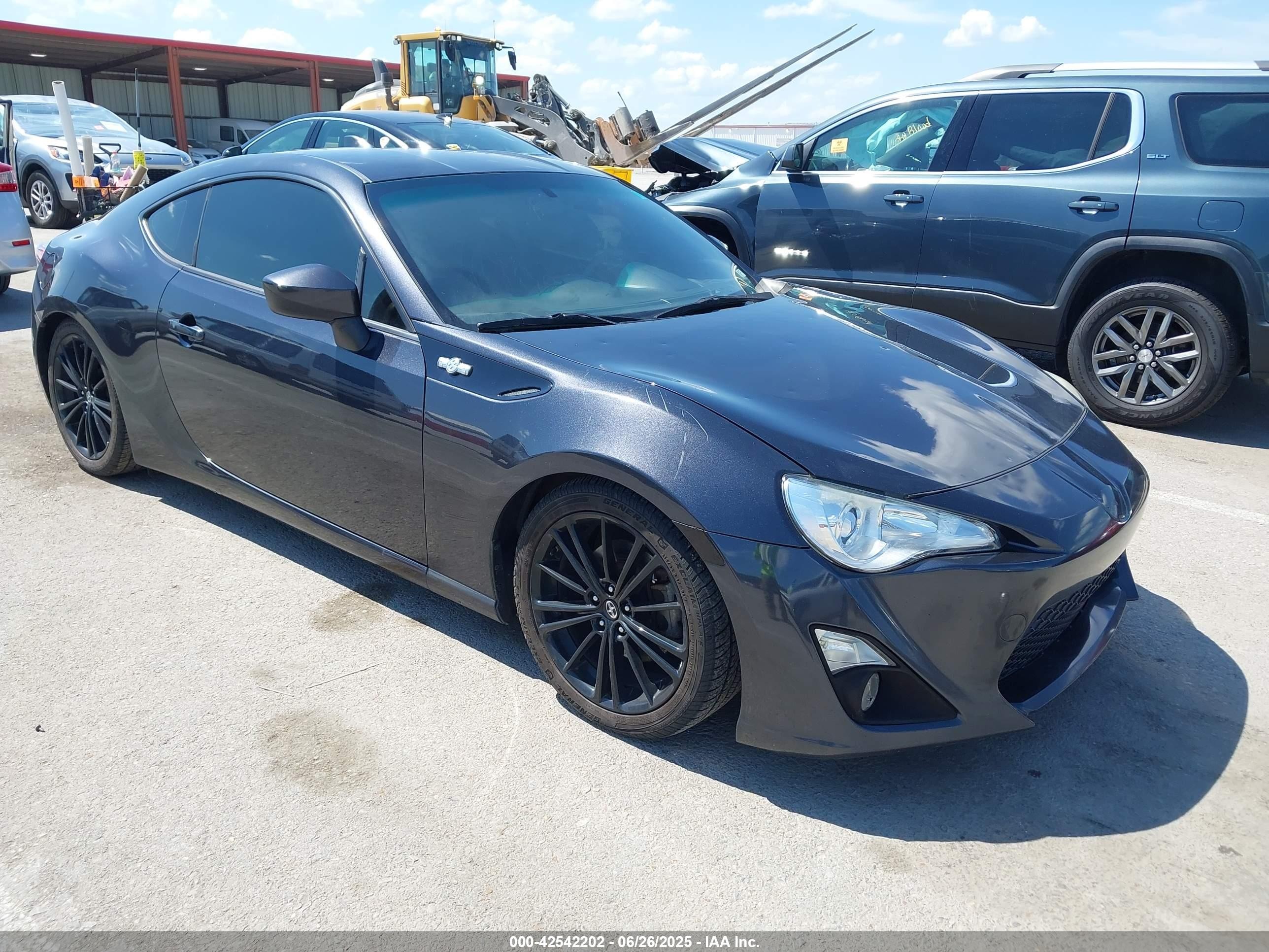 2015 Scion FR-S, VIN JF1ZNAA11F9711593 — Side