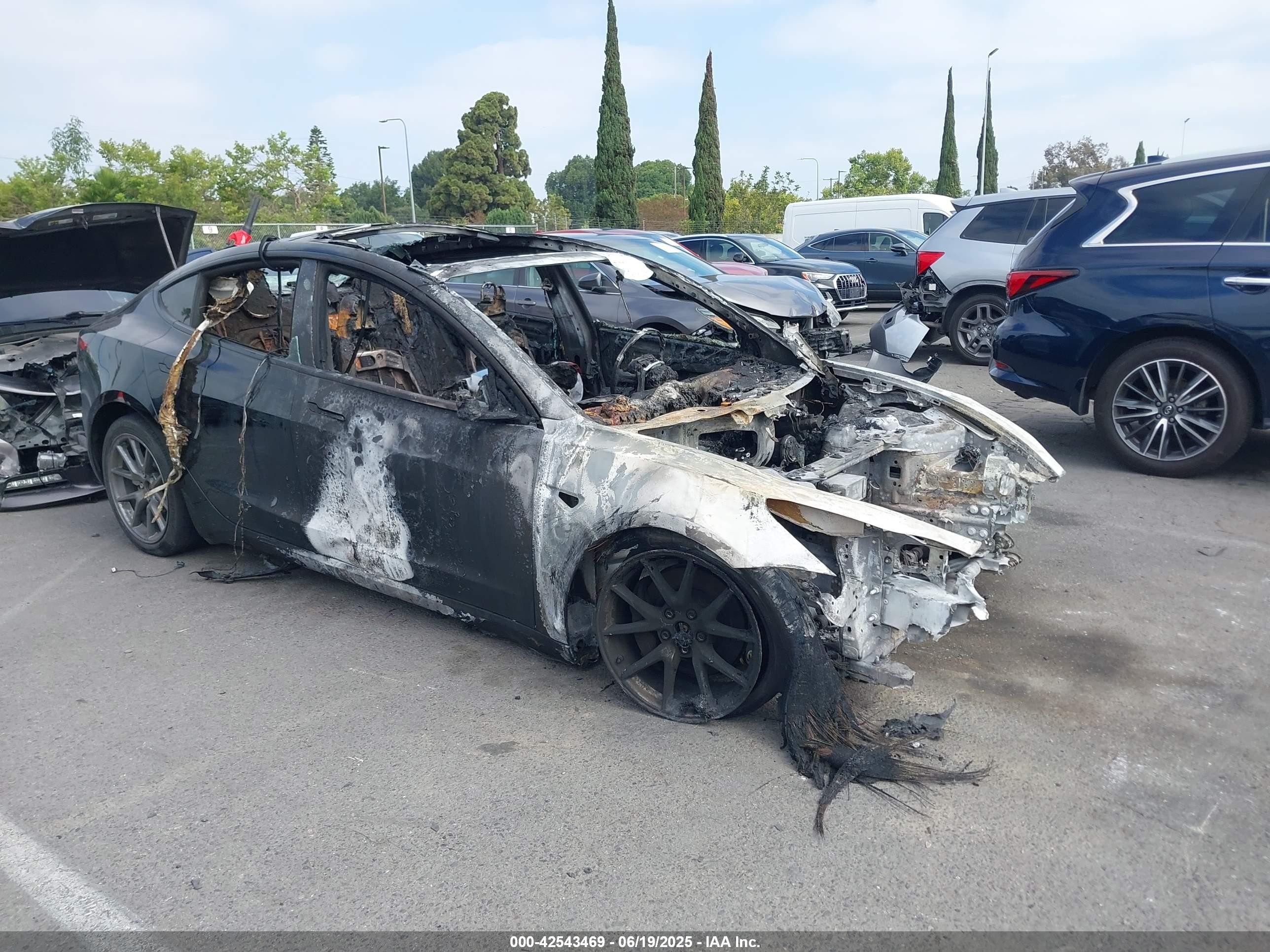 2022 Tesla Model 3 Long Range, VIN 5YJ3E1EB5NF263687 — Engine fire