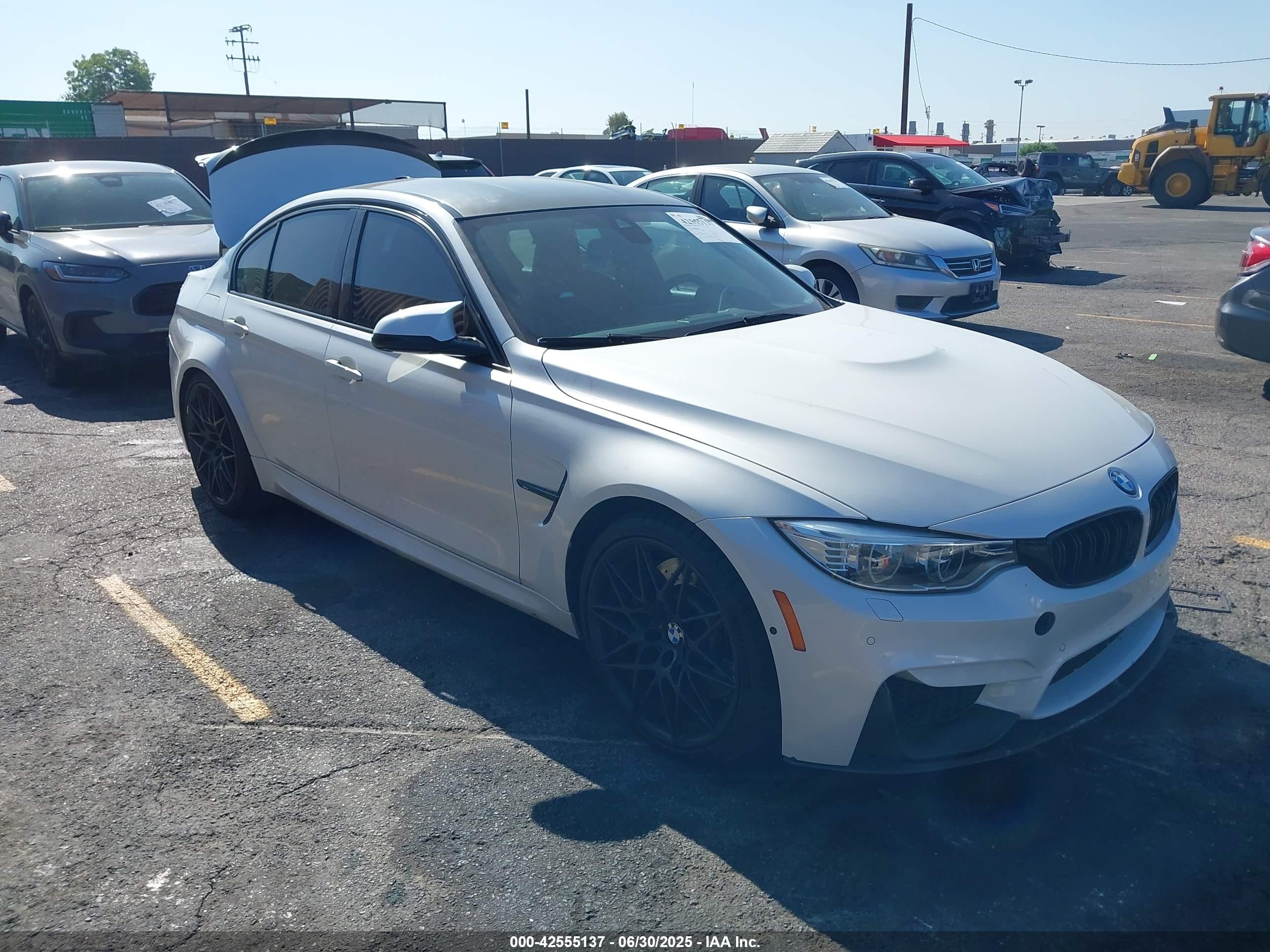 2017 BMW M3, VIN WBS8M9C57H5G83831 — Зад