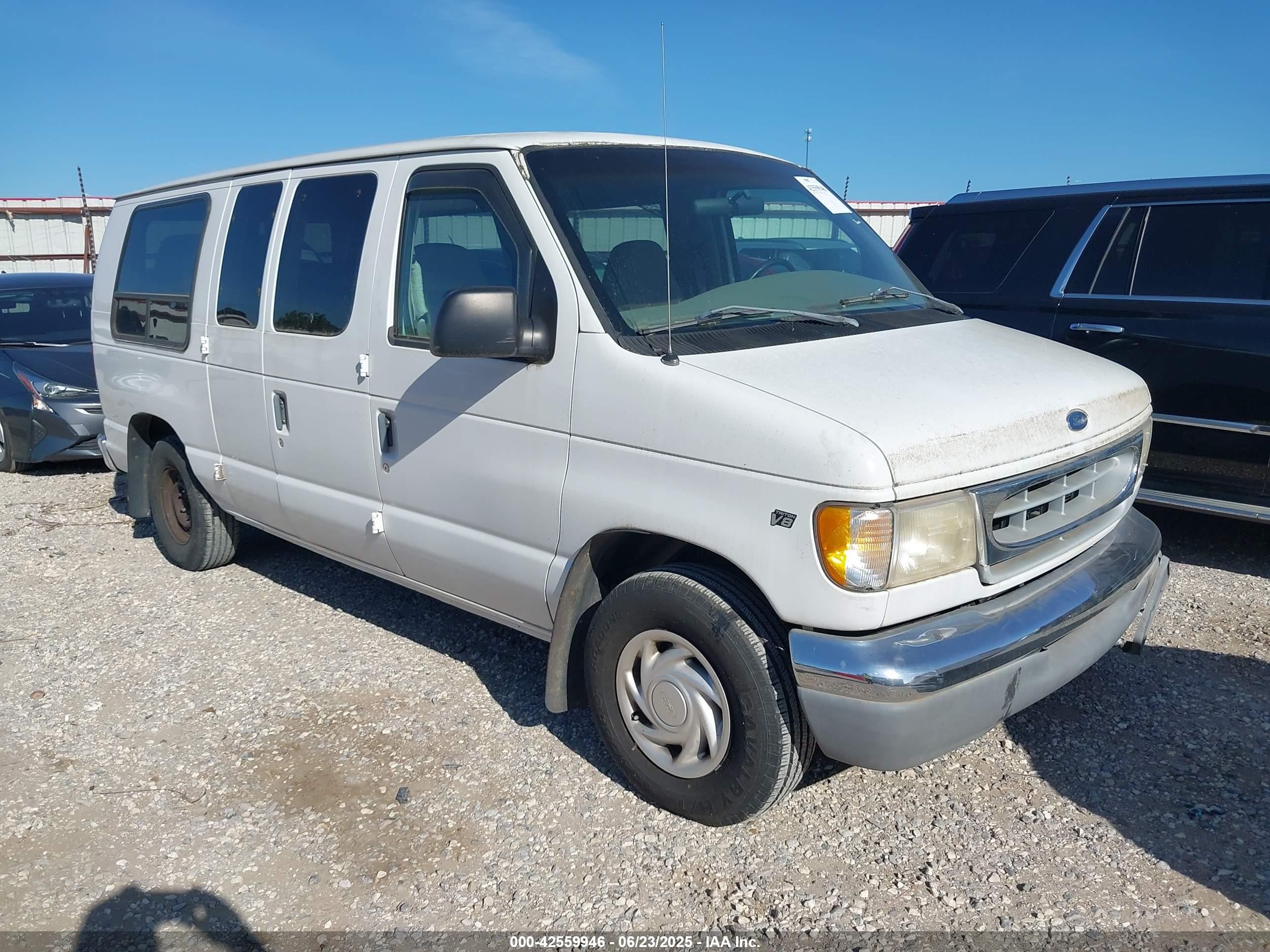 1999 Ford E-150, VIN 1FTRE14L1XHA22703 — Обычный износ