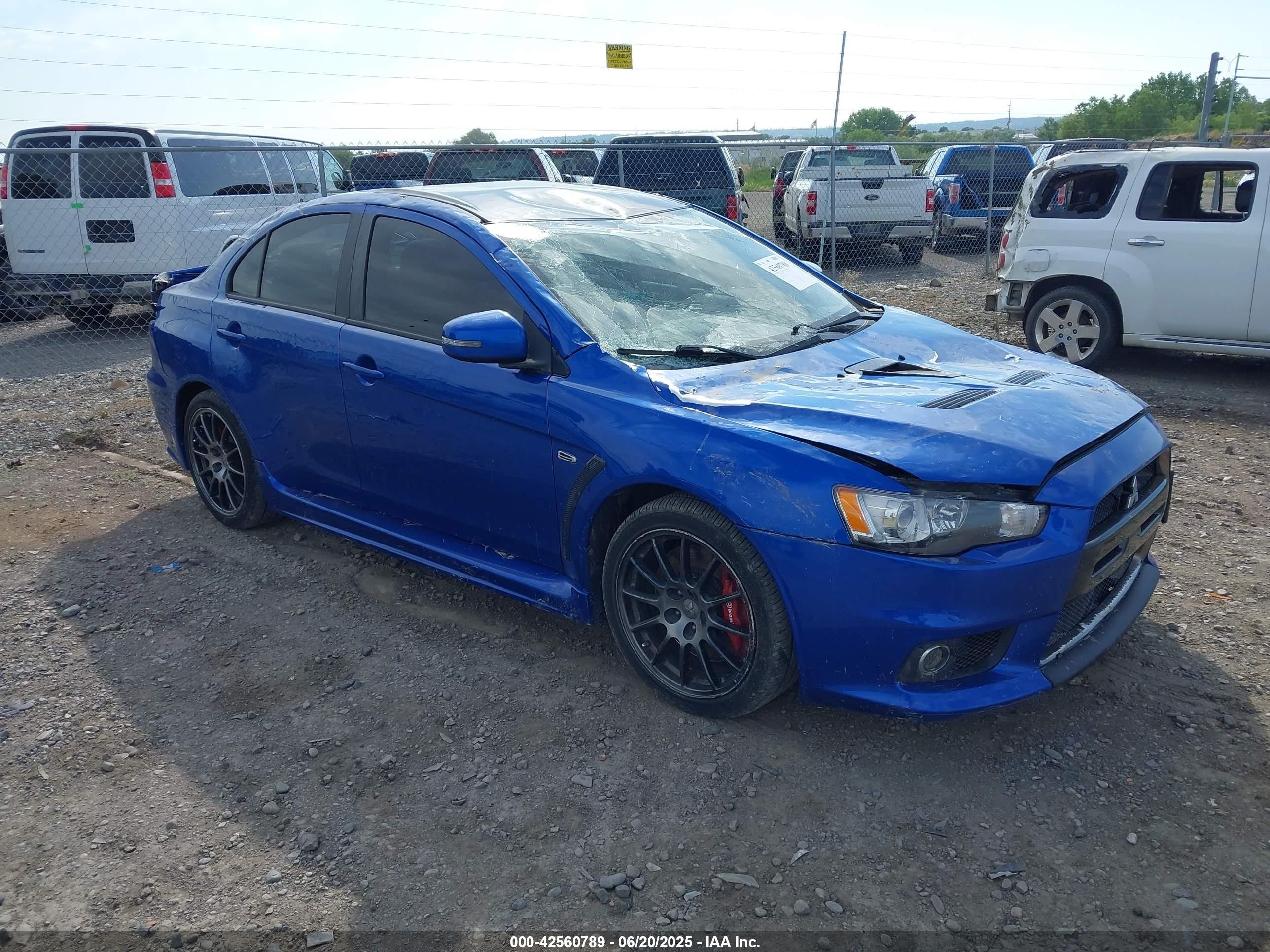 2015 Mitsubishi Lancer Evolution Final Edition, VIN JA32W7FVXFU028861 — Storm