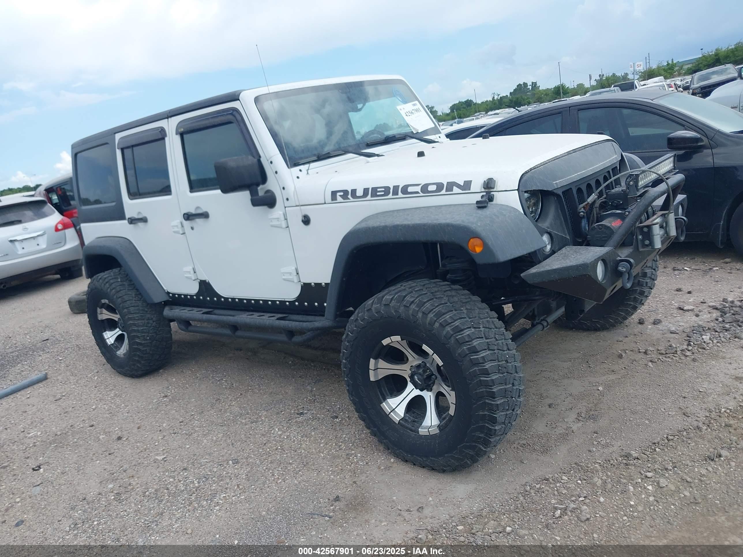 2011 Jeep Wrangler Unlimited Rubicon, VIN 1J4BA6H10BL536027 — Фото с аукциона