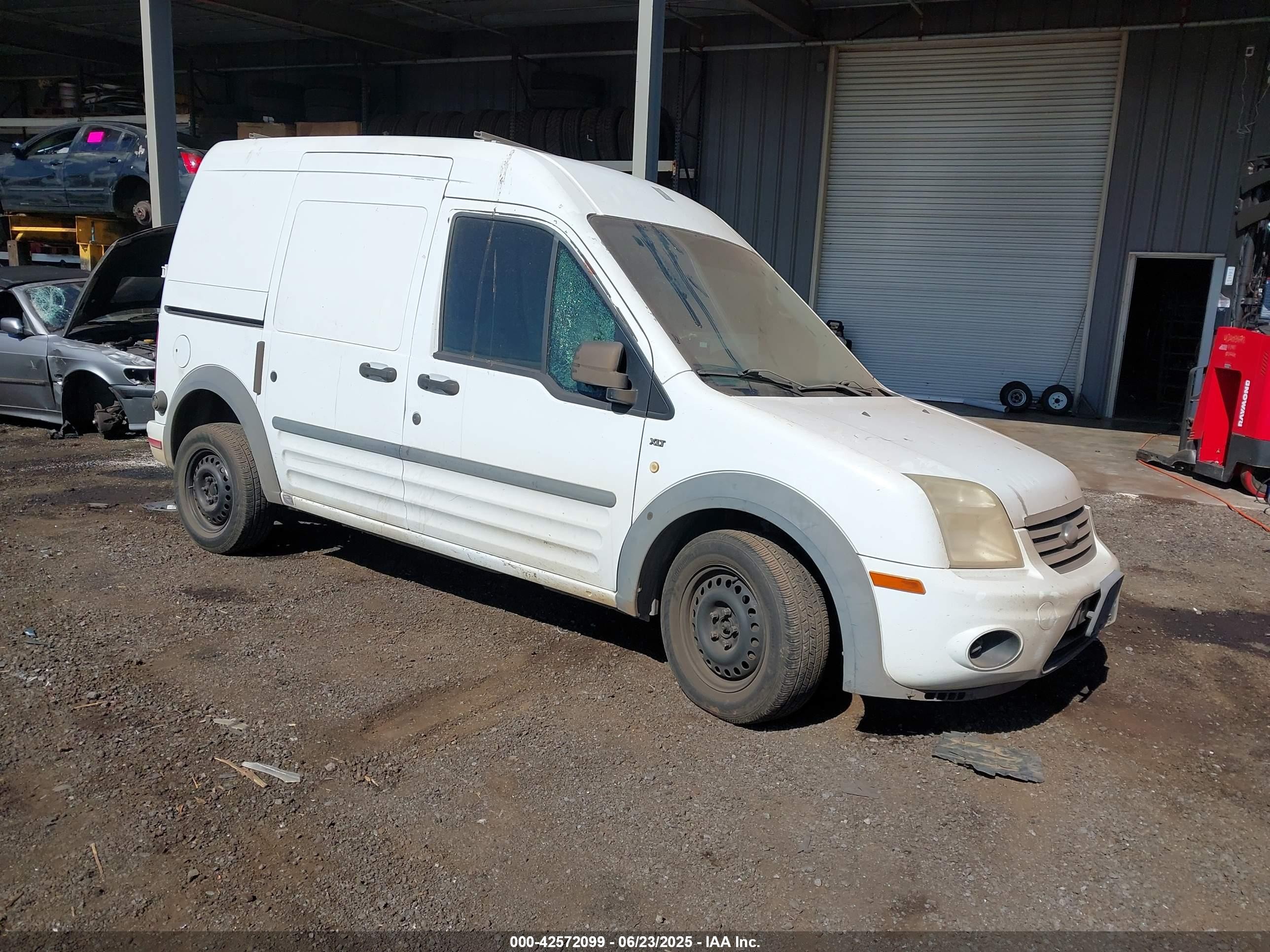 2010 Ford Transit Connect XLT, VIN NM0LS7DN5AT014205 — Side
