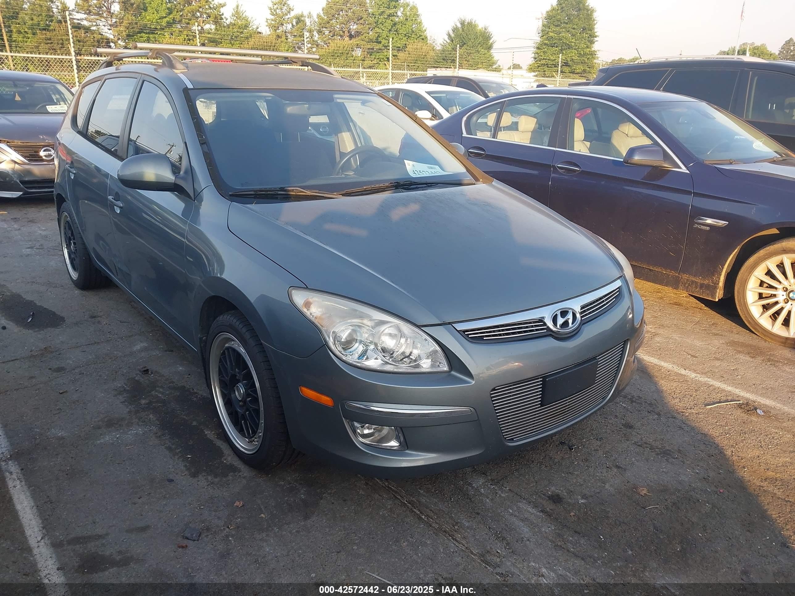 2010 Hyundai Elantra GLS, VIN KMHDC8AE0AU081413 — Auction photo
