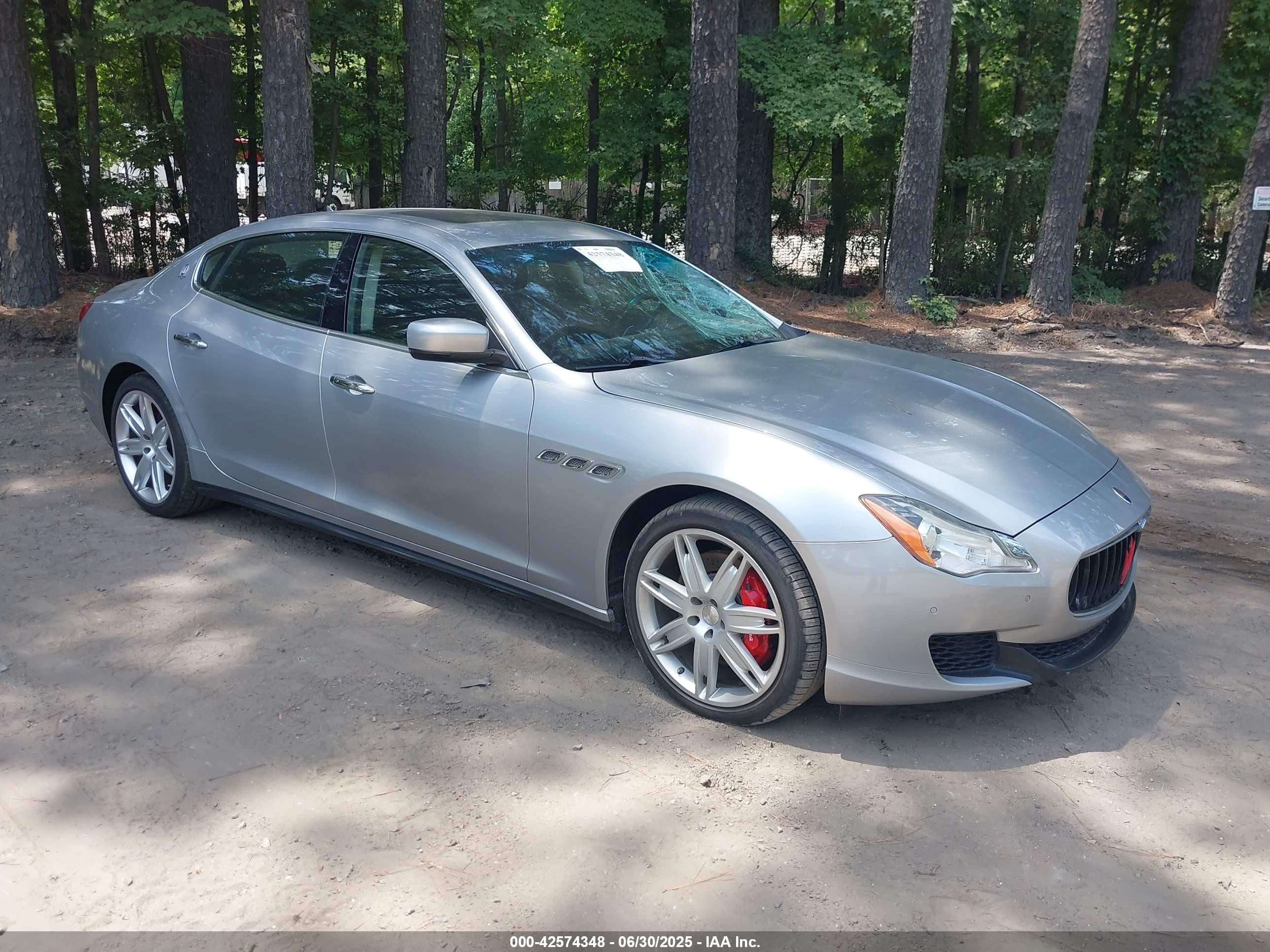 2014 Maserati Quattroporte S Q4, VIN ZAM56RRA9E1106514 — Side