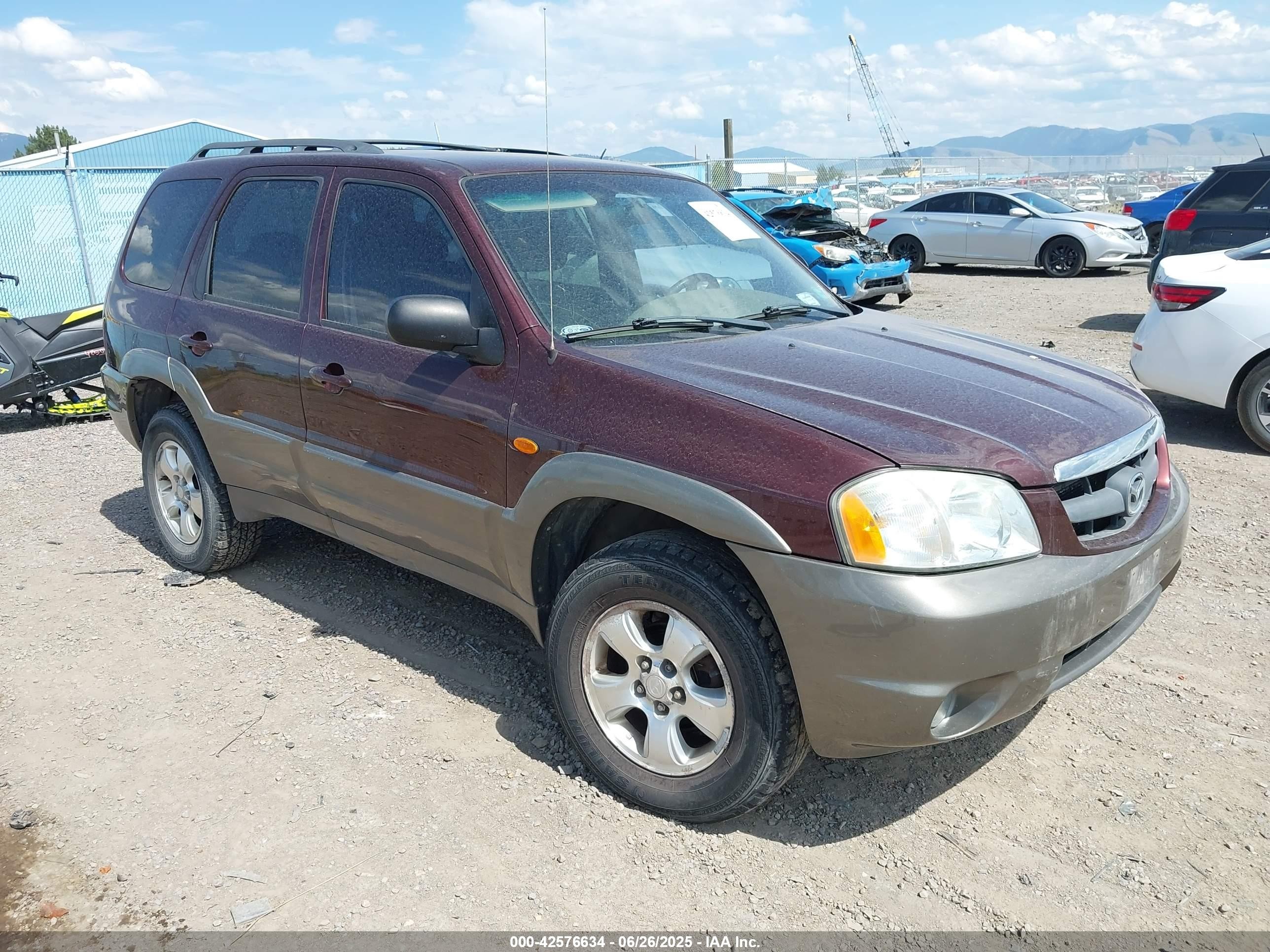 2002 Mazda Tribute LX, VIN 4F2YU08172KM44861 — Side