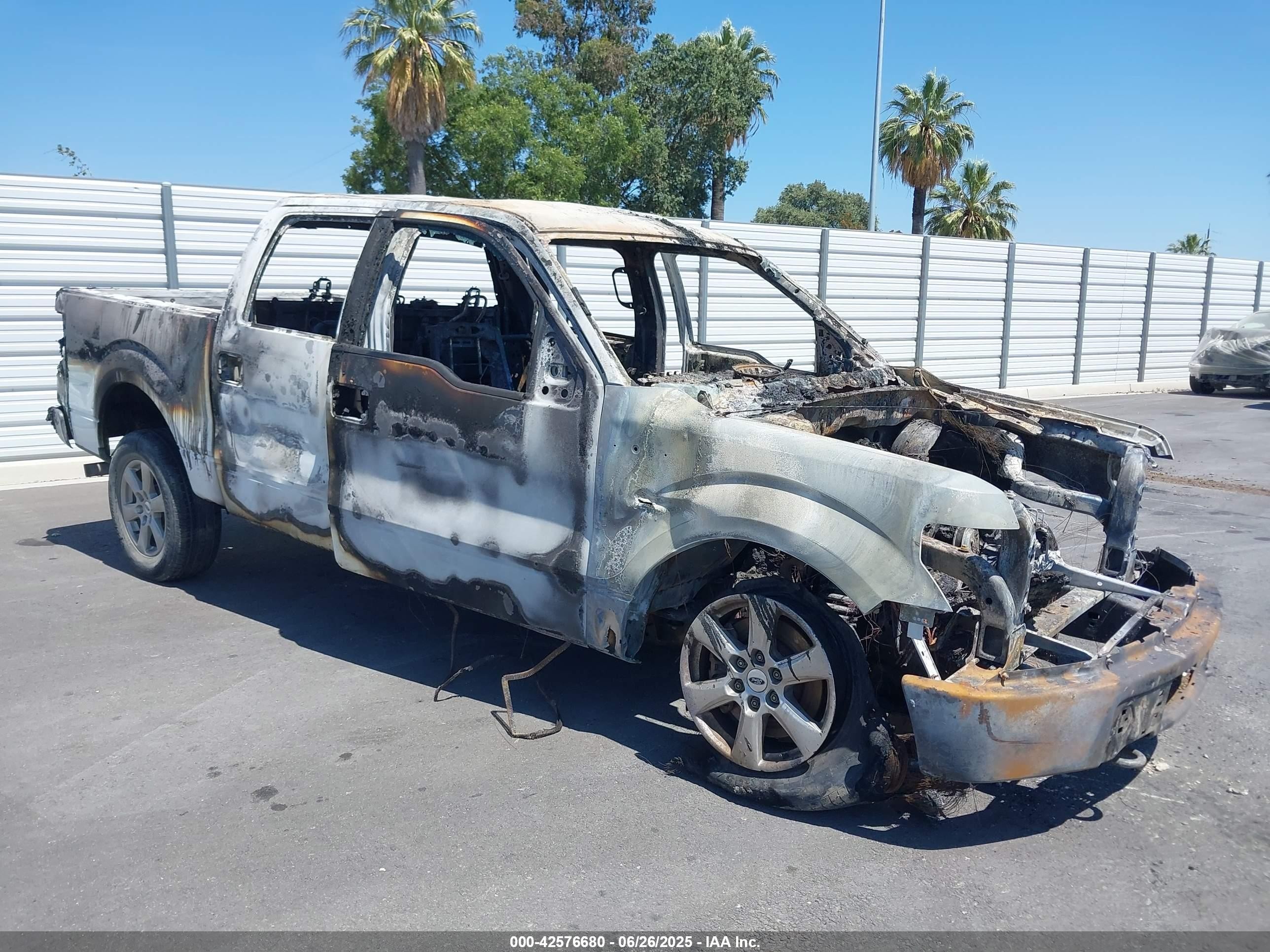 2013 Ford F-150 XLT, VIN 1FTFW1EF7DKD84087 — Engine fire