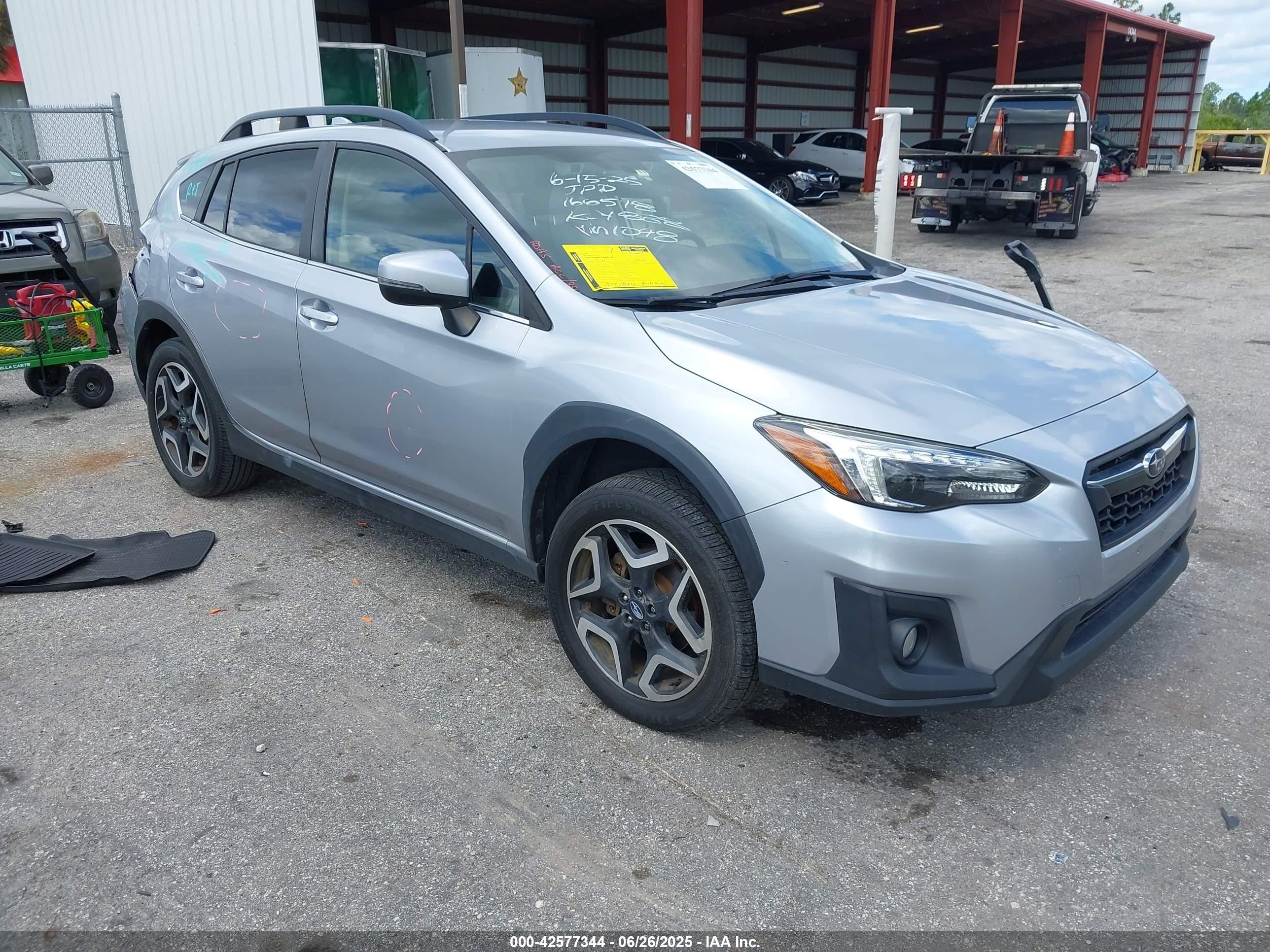 2019 Subaru Crosstrek Limited, VIN JF2GTAMCXKH391048 — Side