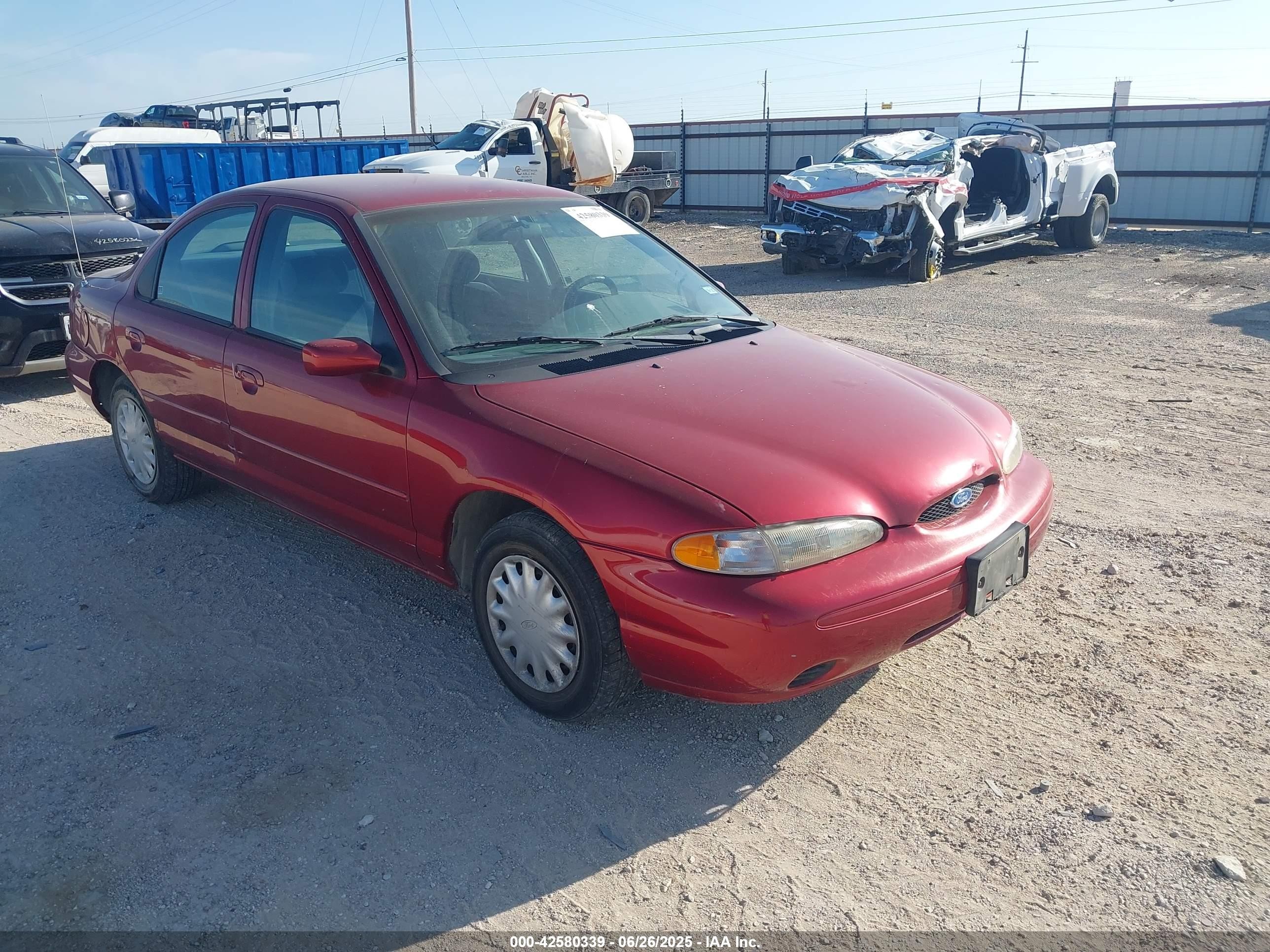 1996 Ford Contour, VIN 3FALP6531TM138104 — Side