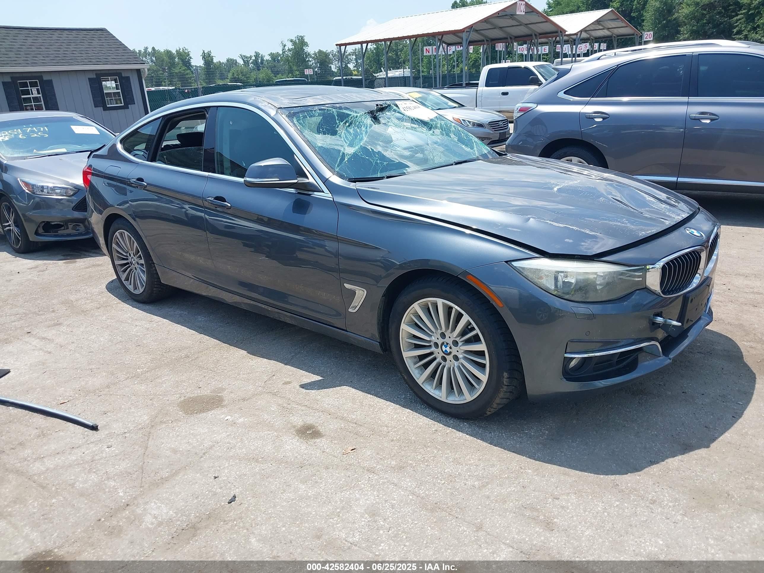 2014 BMW 3 Series 328i Gran Turismo xDrive, VIN WBA3X5C57ED558972 — Rear end