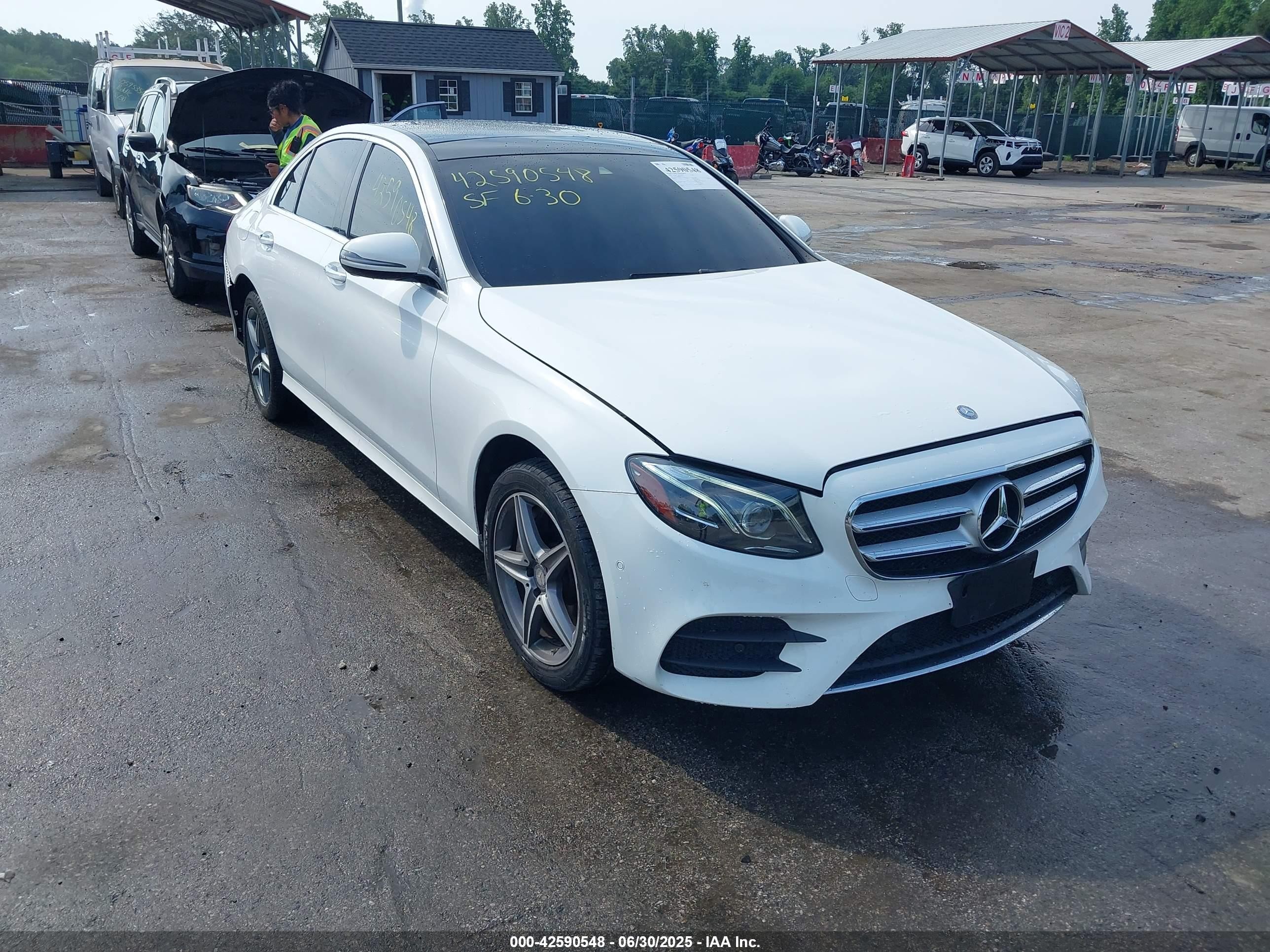 2017 Mercedes-Benz E 300 Luxury, VIN WDDZF4KB4HA070513 — Rear end
