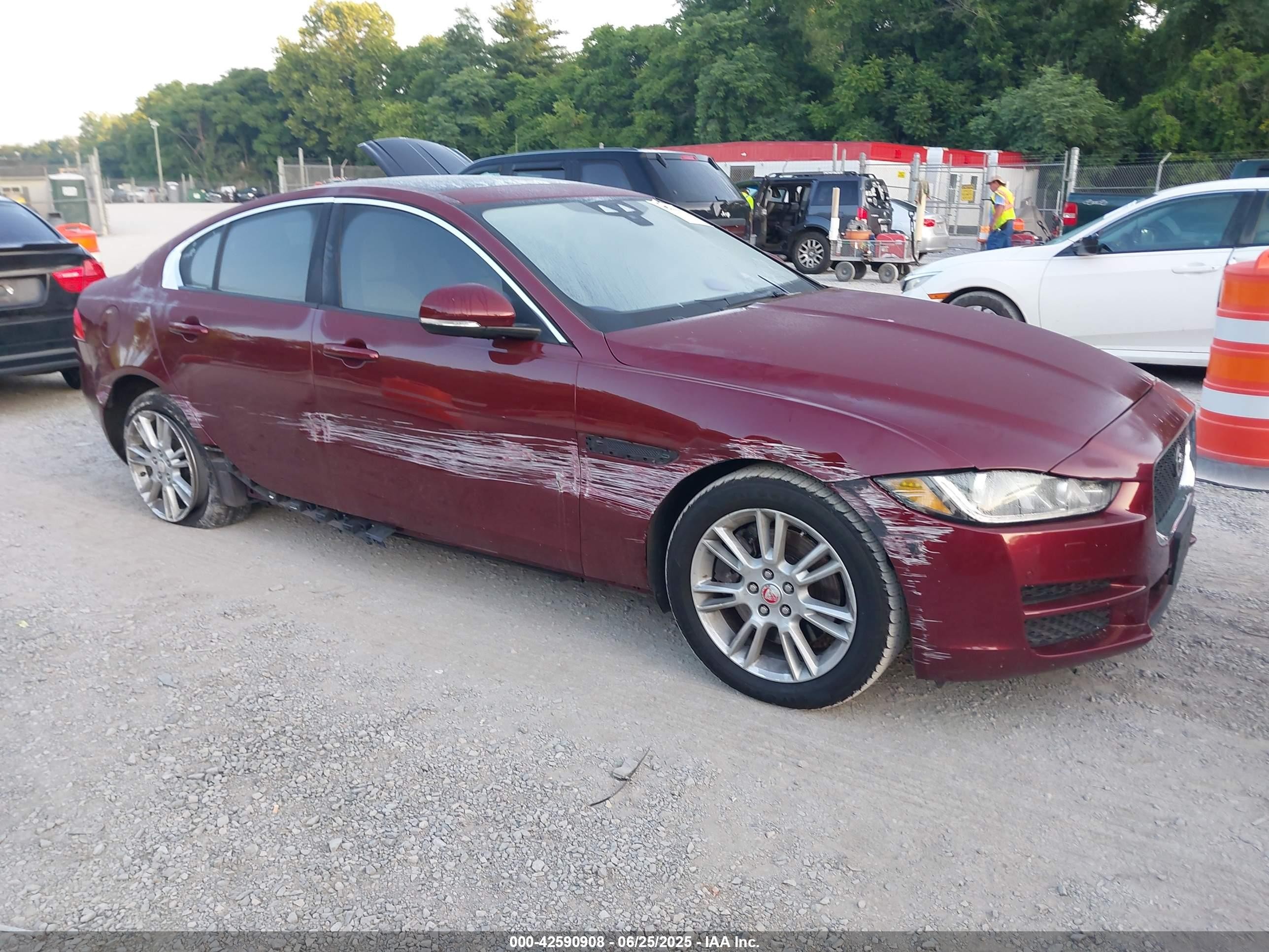 2017 Jaguar XE 25t Premium, VIN SAJAD4BGXHA947189 — Side