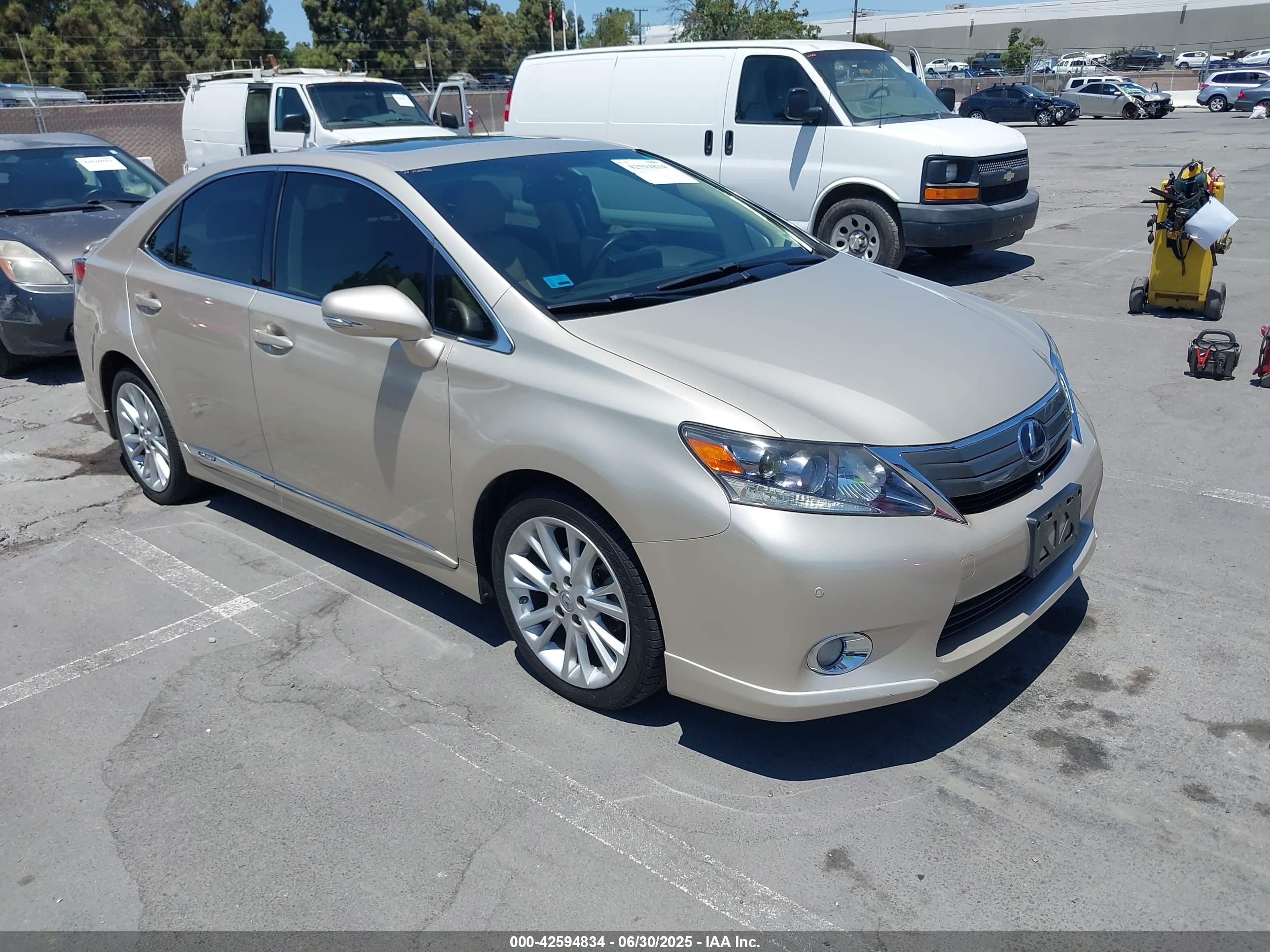 2011 Lexus HS 250h, VIN JTHBB1BA5B2046086 — Side