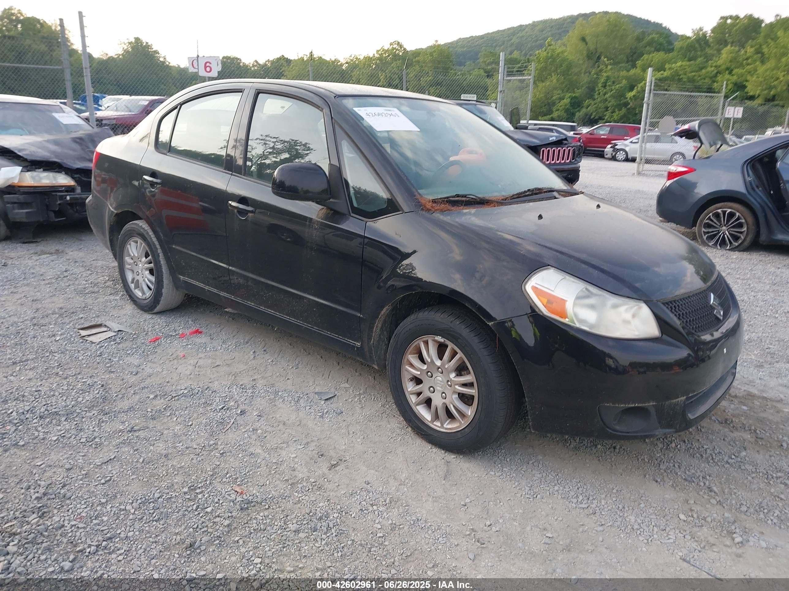 2013 Suzuki SX4 LE, VIN JS2YC5A31D6100259 — Front end