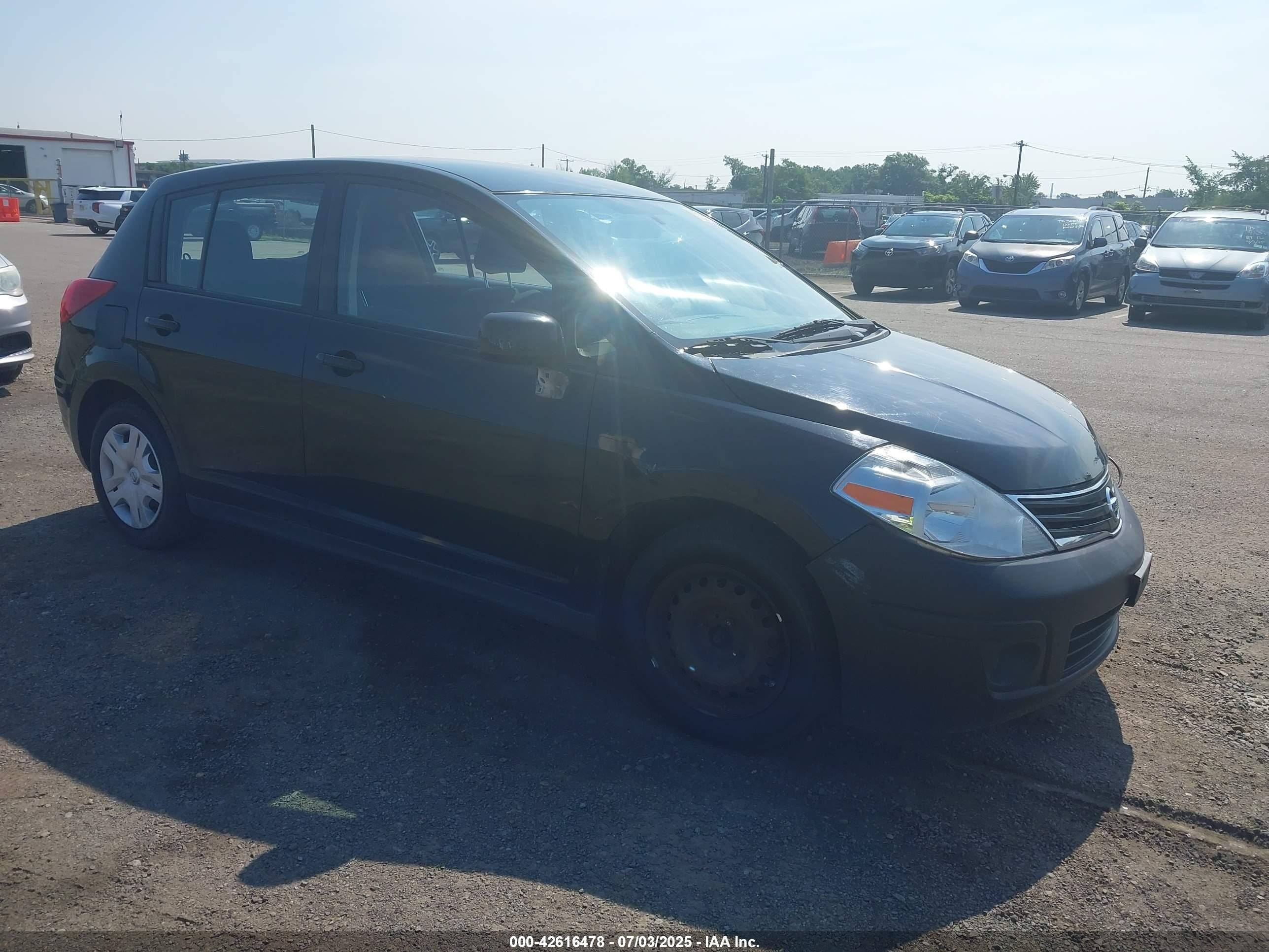2011 Nissan Versa SL, VIN 3N1BC1CP3BL502220 — Auction photo