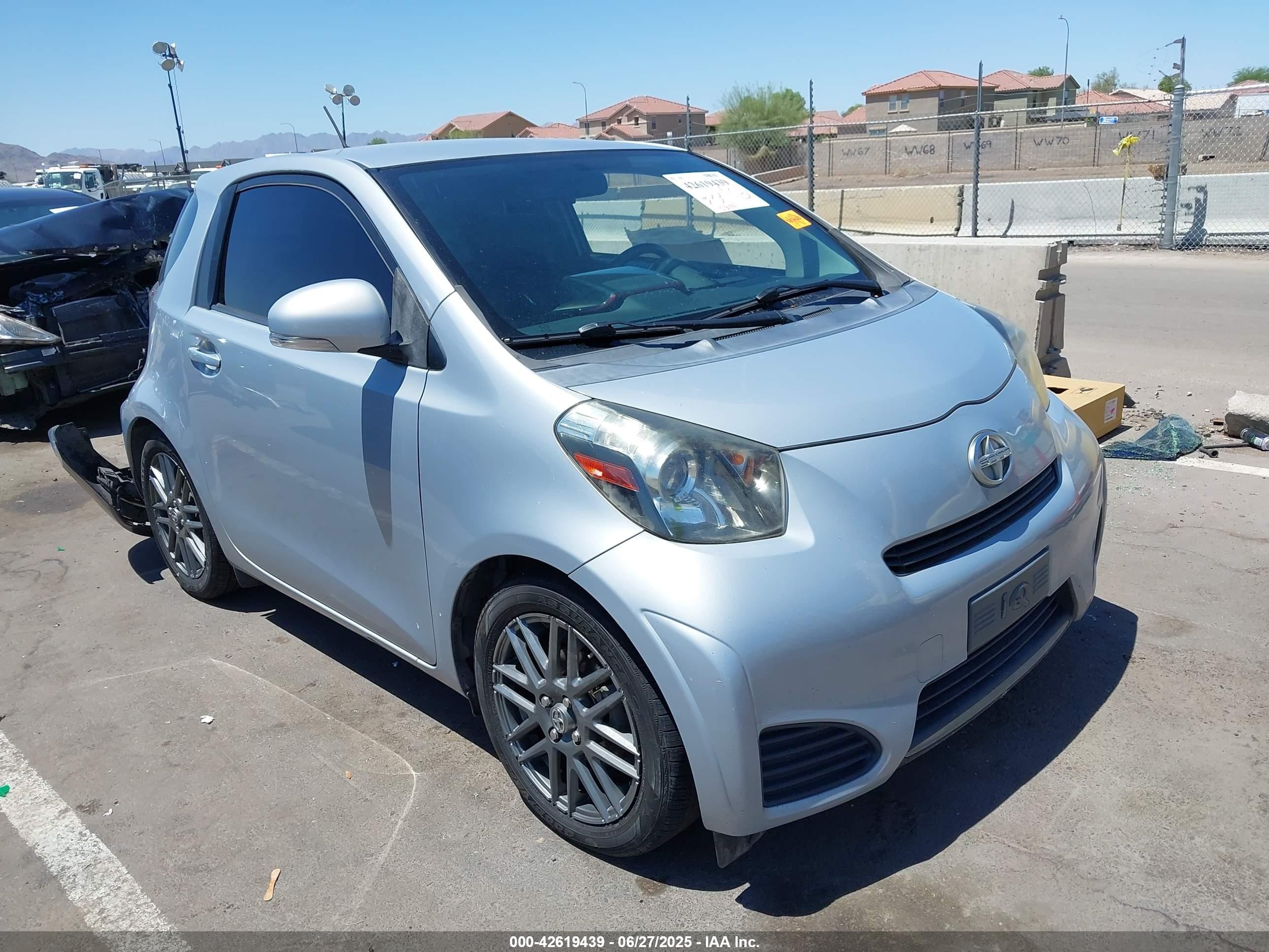 2014 Scion iQ, VIN JTNJJXB02EJ027026 — Side