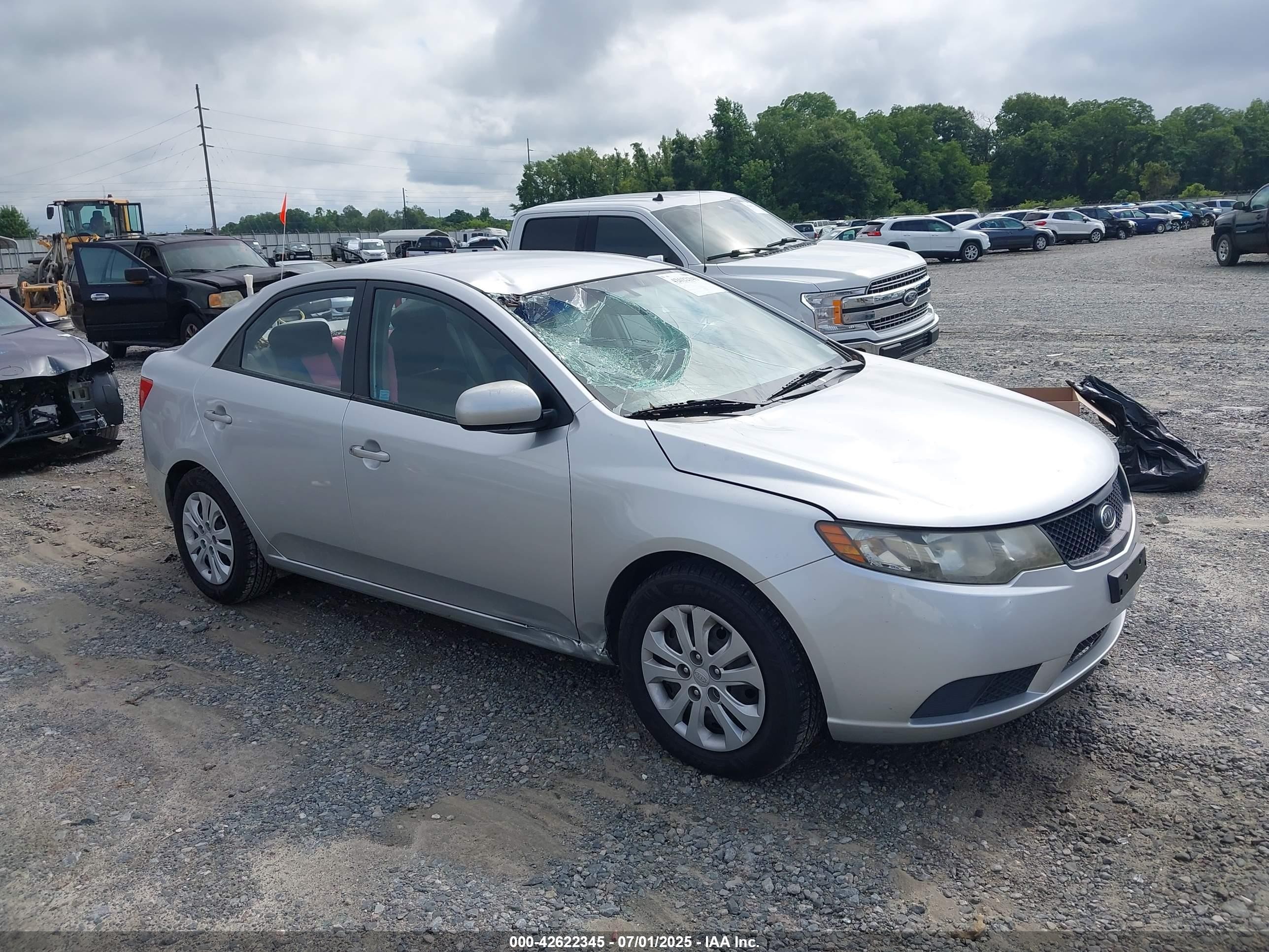 2010 Kia Forte LX, VIN KNAFT4A2XA5087044 — Storm